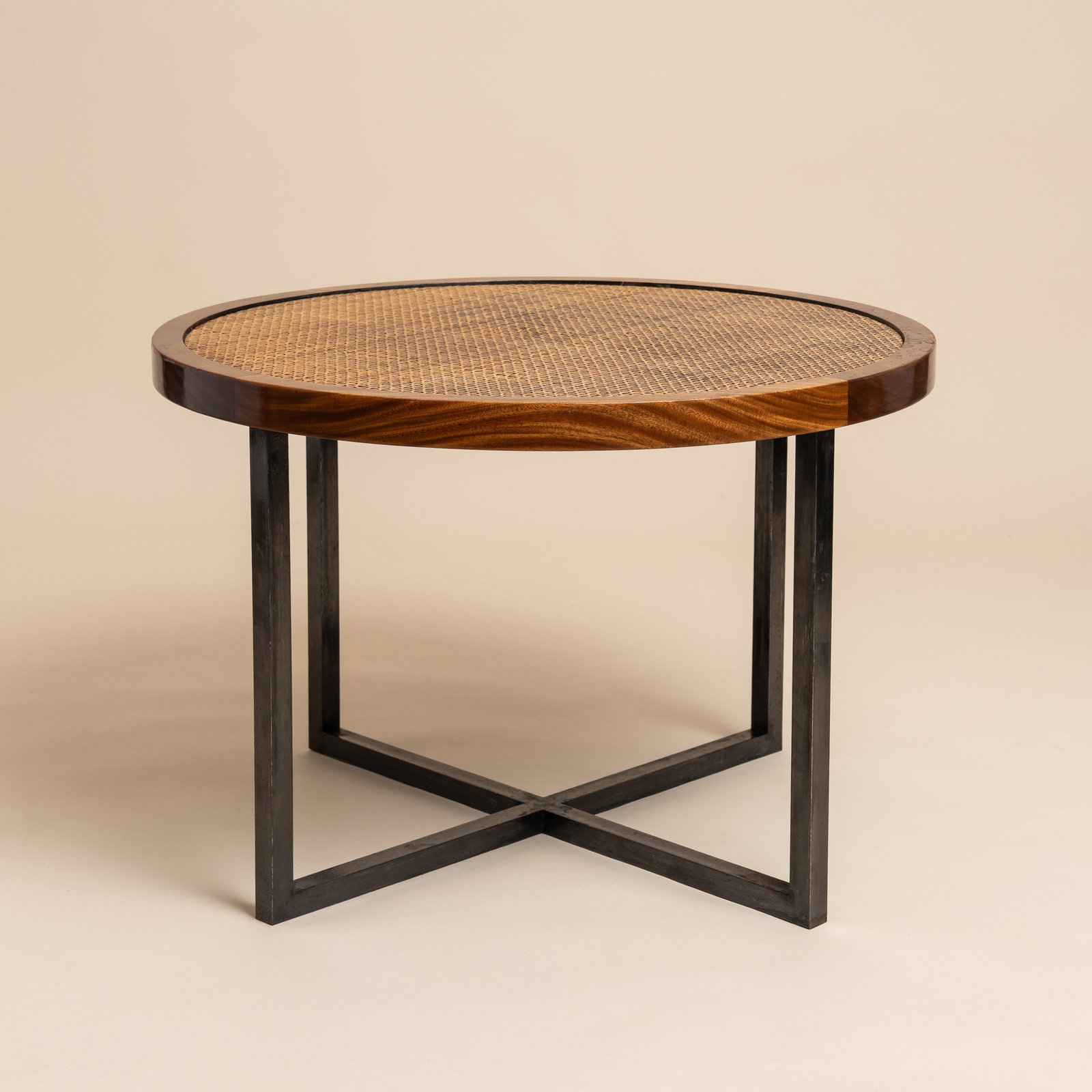 Jean-Michel Frank (French 1895-1941) for COMTE, Argentina Circular low table: Circa 1940s Rattan, cherrywood, iron Executed by Jean Michel Frank for COMTE, Buenos Aires, Argentina, comissioned by Frtiz Mandl Applied 'COMTE' plaque to underside 50cm high x 76cm diameter Provenan