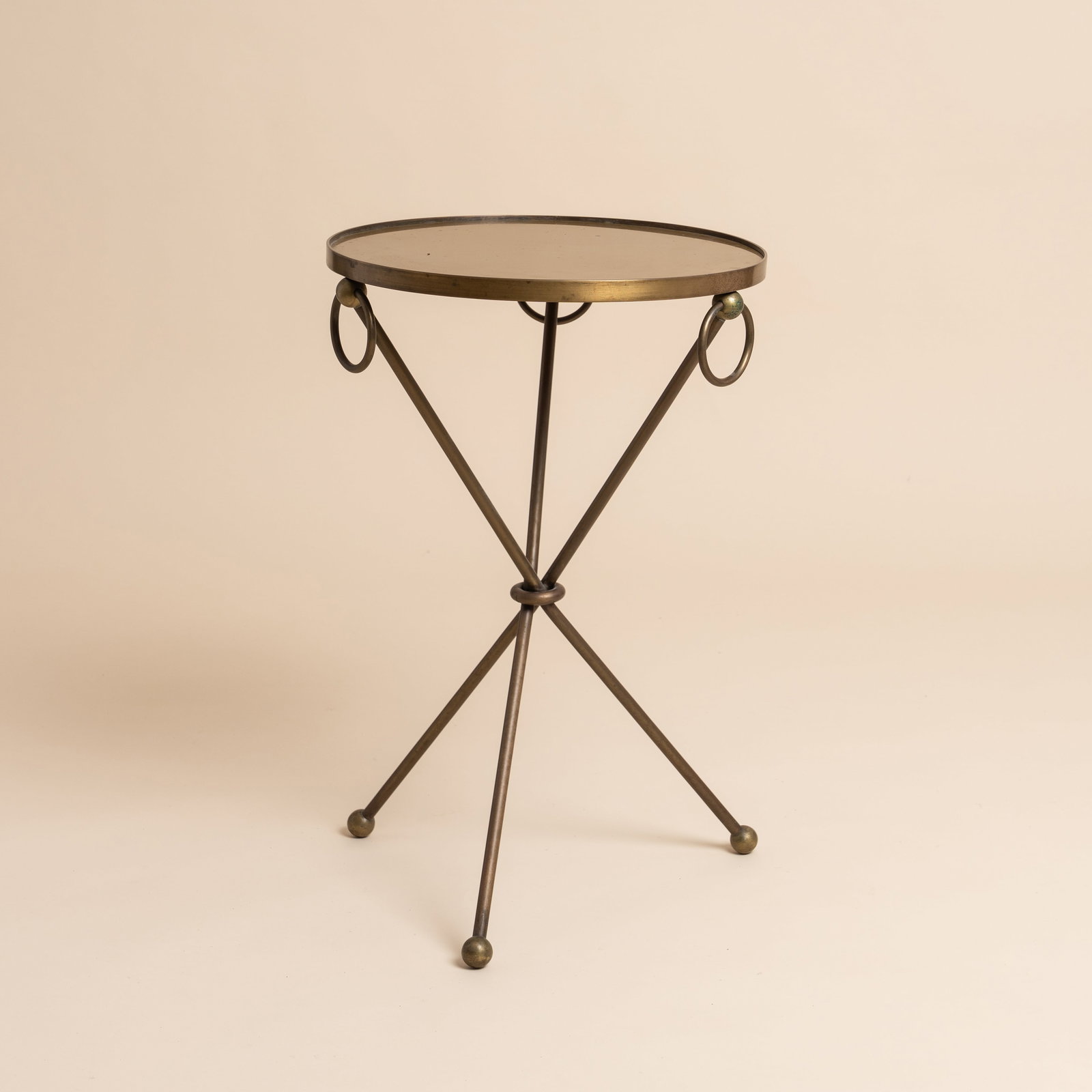 Attributed to Jean-Michel Frank (1895-1941) Guéridon: France, circa 1940 Brass 62cm high x 40cm diameter Literature Léopold Diego Sanchez, Jean-Michel Frank, Paris, 1997, pp. 69, 146, 167 and 208 Pierre-Emmanuel Martin-Vivier, Jean-Michel Frank, l'étra