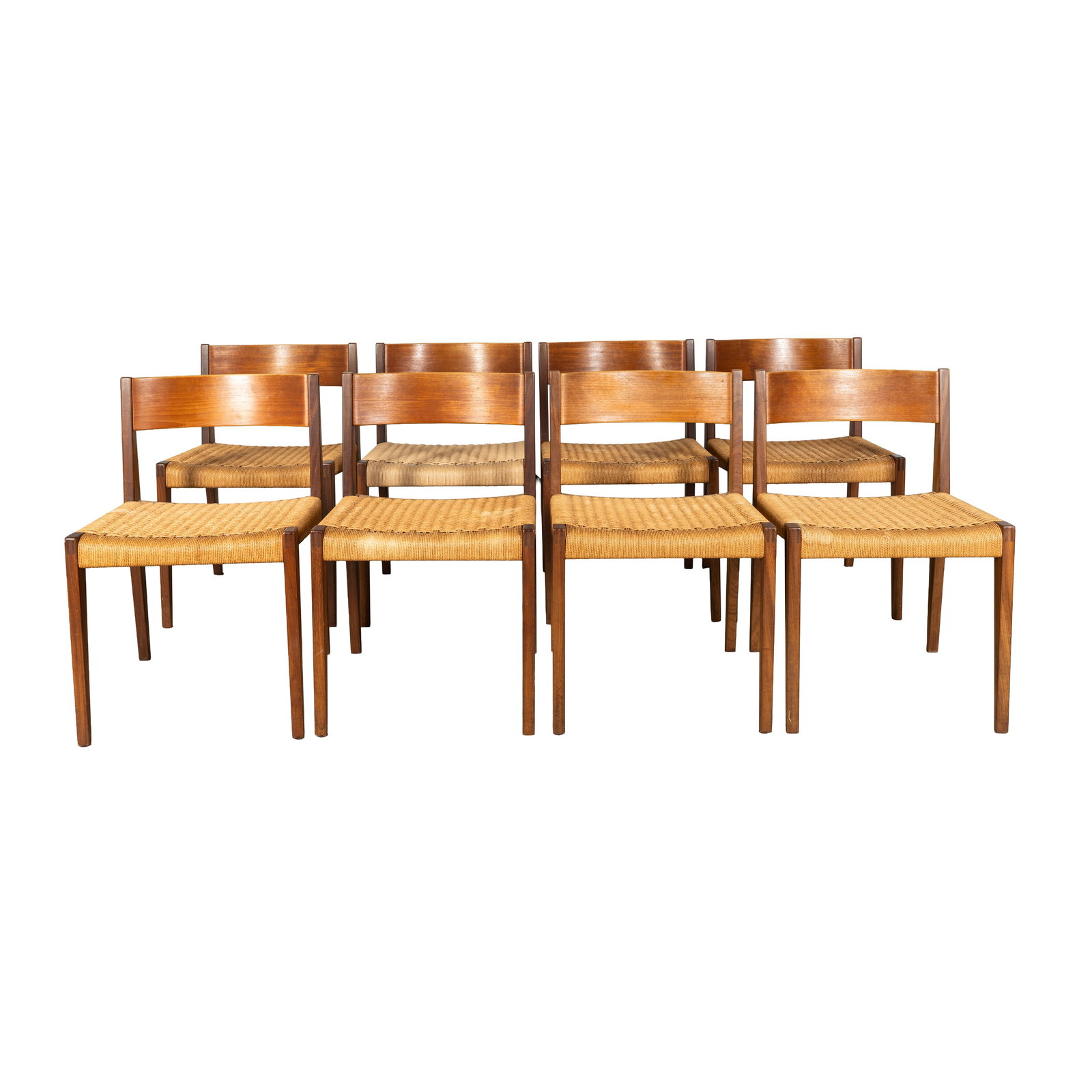Poul Cadovius (Danish 1911-2011) Set of Eight Pia Chairs: Circa 1959 Walnut, teak, paper cord Stamped 'Made in Denmark' 74cm high x 48cm wide x 43cm deep