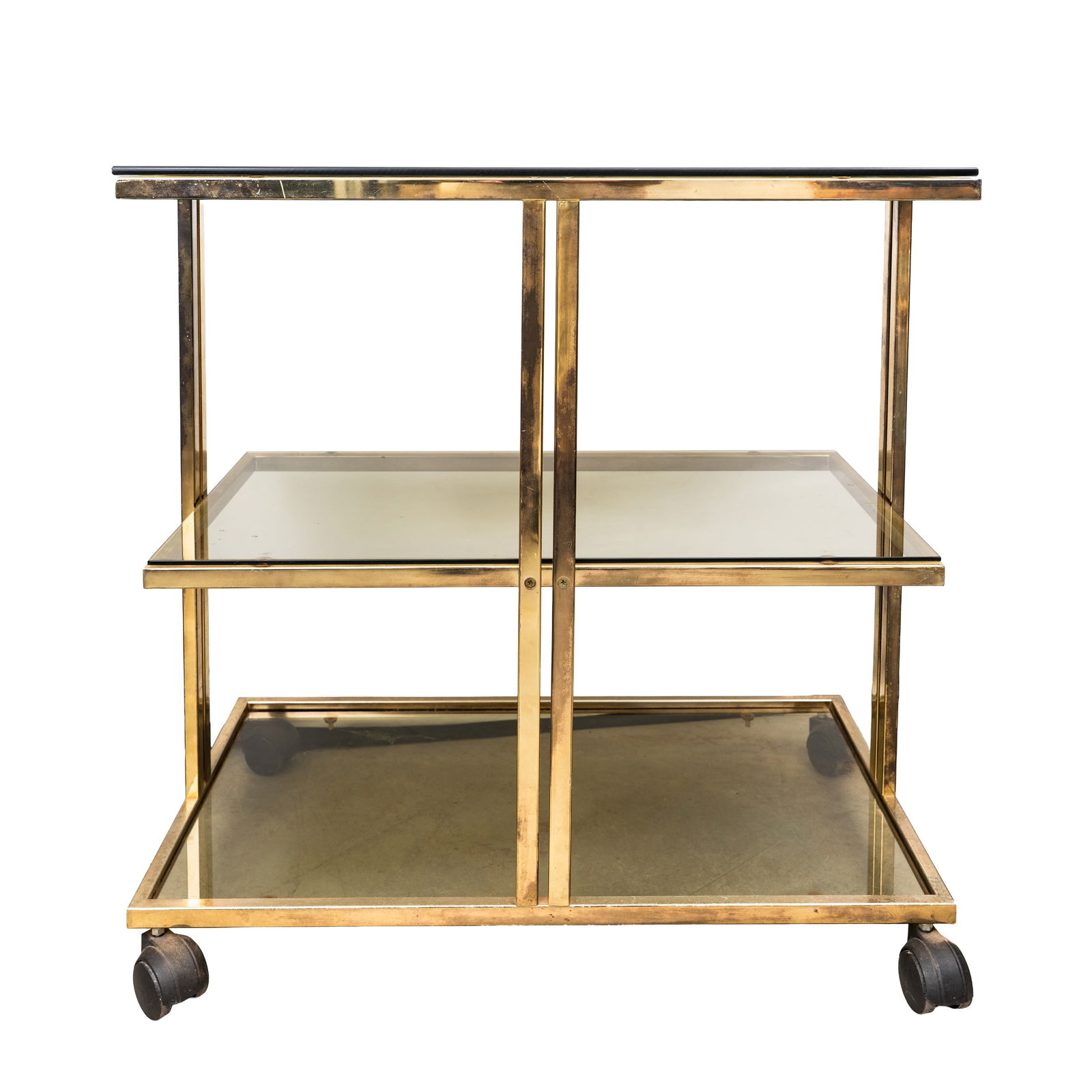 Vittorio Introini (Italian, b.1935) Trolley or bar cart: Circa 1970s Brass, glass, castors 77cm high x 75cm wide x 40cm deep Provenance:From a private Italian collection