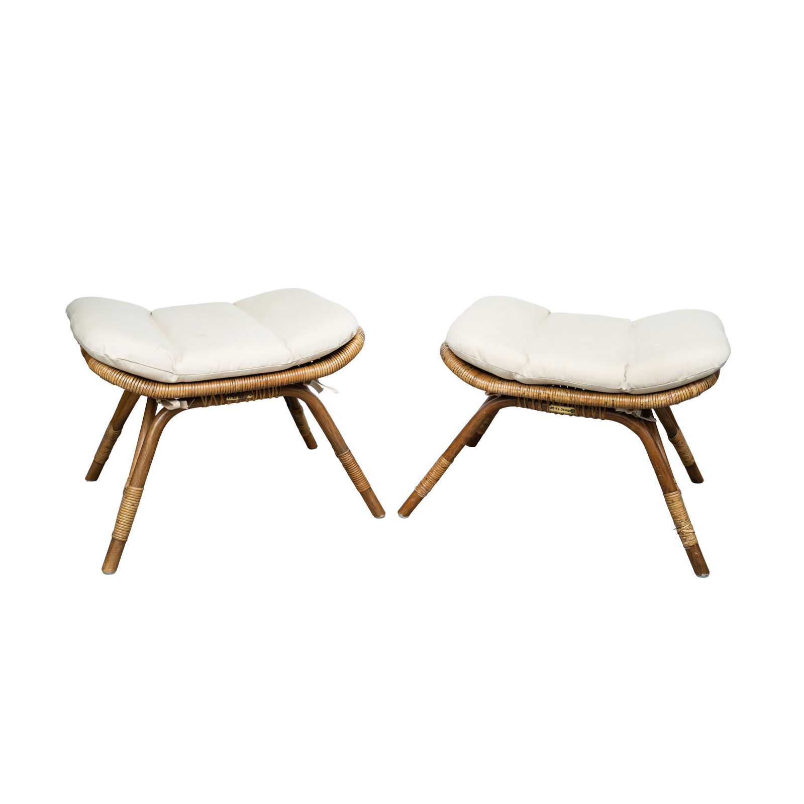 Originals for Sika Desgin, Denmark Pair of piano stool: 1970s Rattan, bamboo, cotton cushions Labelled to reverse 43cm high x 52cm wide x 44cm deep Provenance:From a private Italian collection