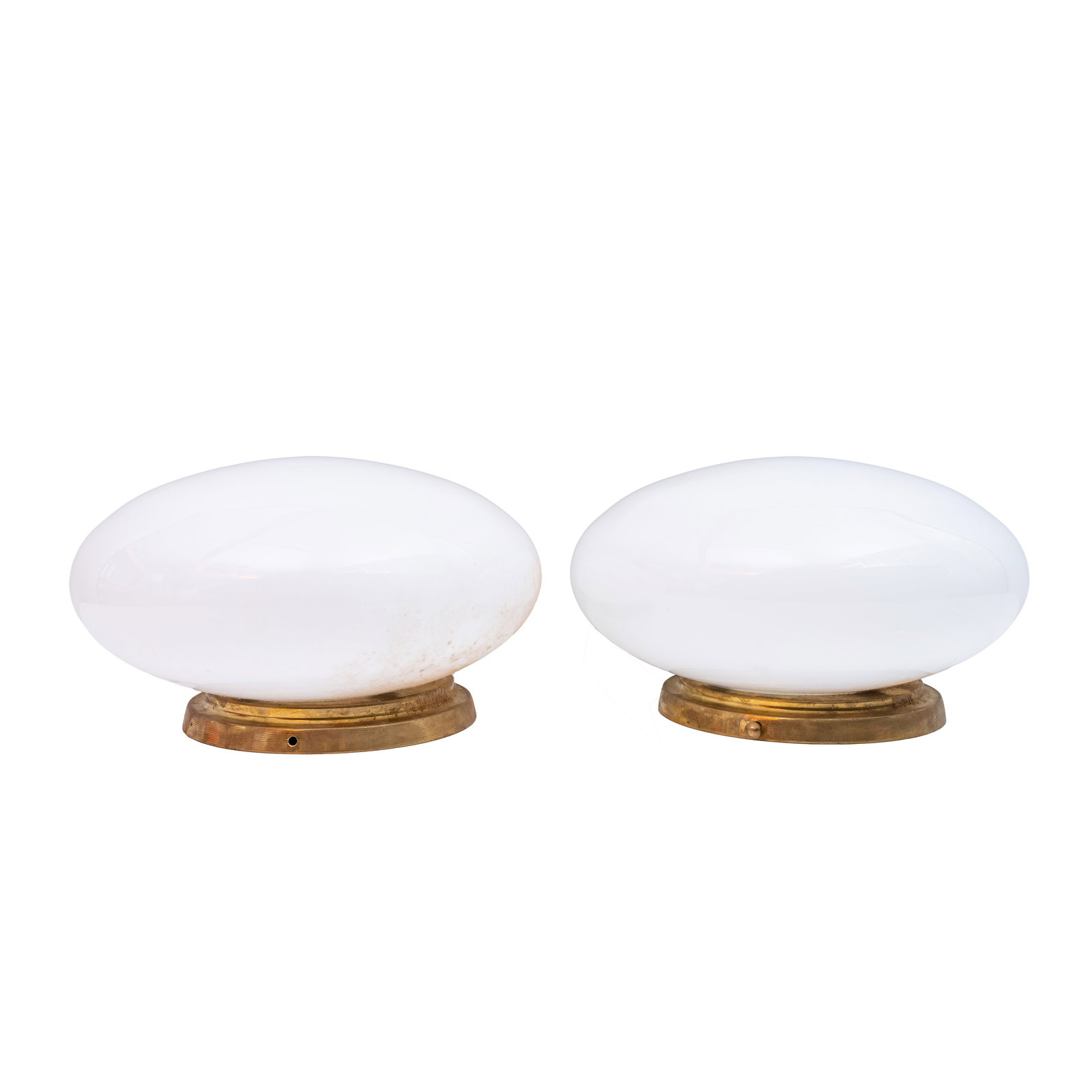 Venini, Italy Pair of wall or ceiling lights: Circa 1970s Opaline latte glass, brass 13cm high x 27cm diameter Provenance:From a private Italian collection