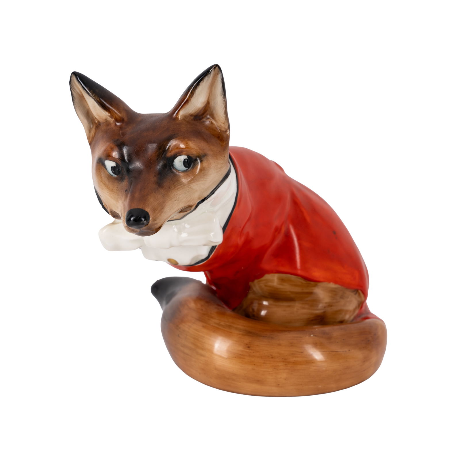 Charles Noke (British 1858-1941) for Royal Doulton Model of a fox wearing hunting dress, model HN100: 1920s Porcelain Printed factory mark, painted model number to underside 15cm high Provenance:Paper label to underside 'London Ceramic Circle Exhibition 2014'