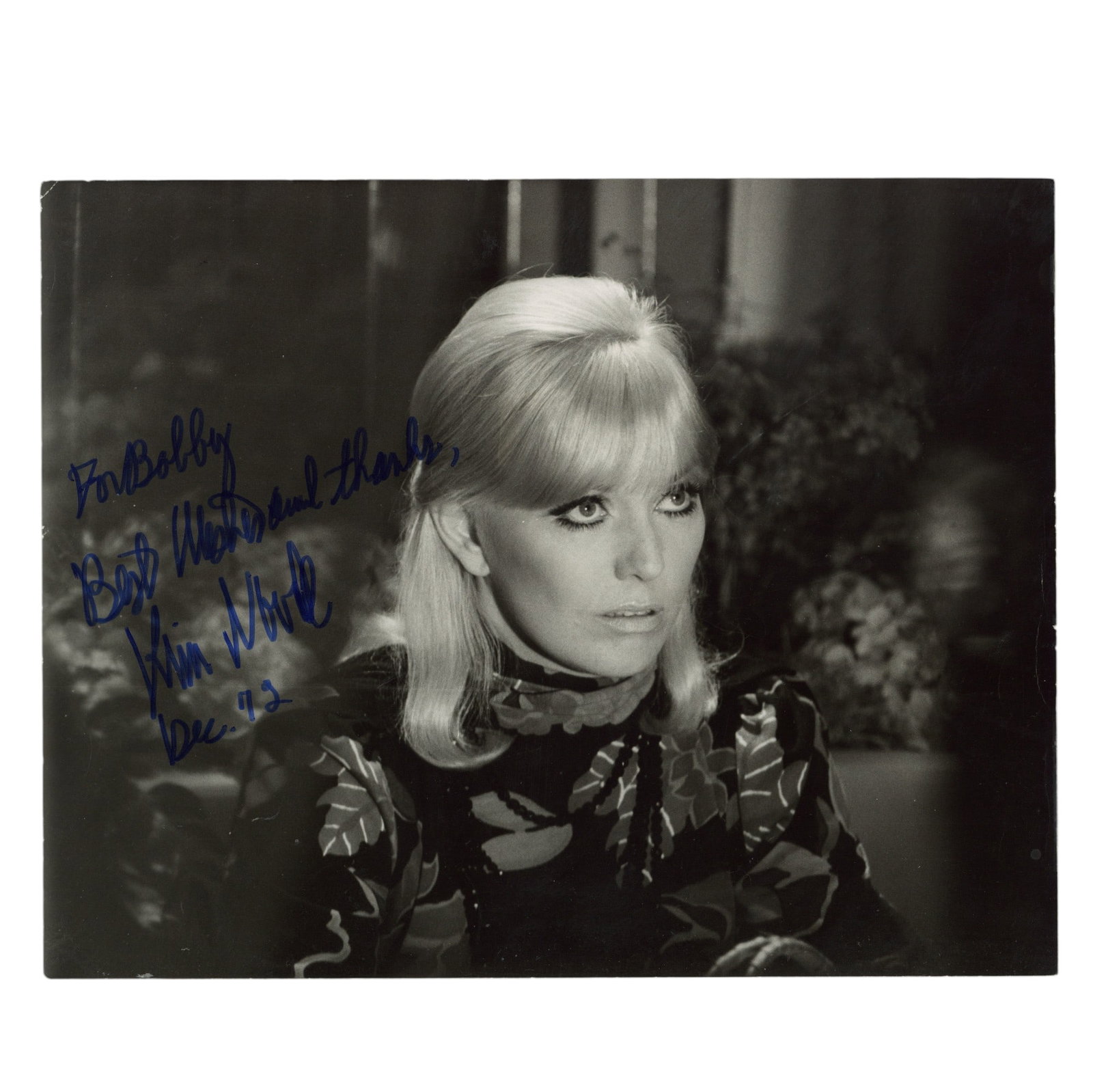 Novak (Kim) Signed photograph: Novak (Kim) Signed photograph Glossy black and white photograph oh Kim Novak, signed and inscribed in blue felt tip "For Bobby [Murrell], Best wishes and thanks, Kim Novak, Dec. 72", som creasing and