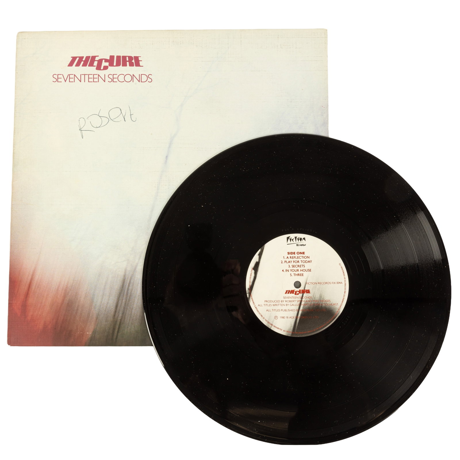 Smith (Rob) The Cure. Seventeen Seconds signed album: Smith (Rob) The Cure. Seventeen Seconds signed album A 12" vinyl copy of the album 'Seventeen Seconds', signed by Rob Smith in black felt tip across the front cover, minor handling wear, record is