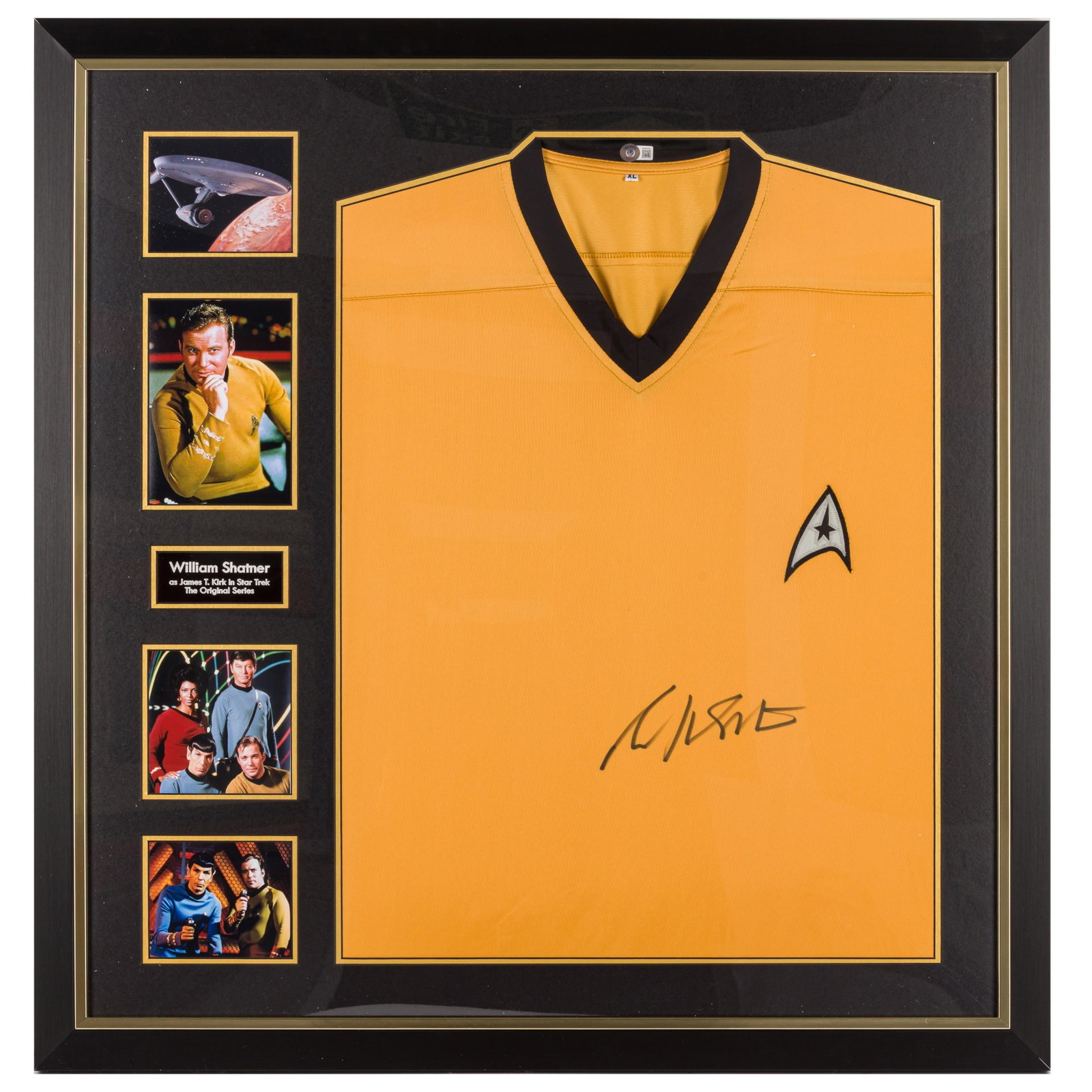 Shatner (William) Signed Star Trek shirt: Shatner (William) Signed Star Trek shirt A replica of the iconic gold uniform worn by Captain James T. Kirk, signed by William Shatner in black ink, attractively mounted for display with photographic