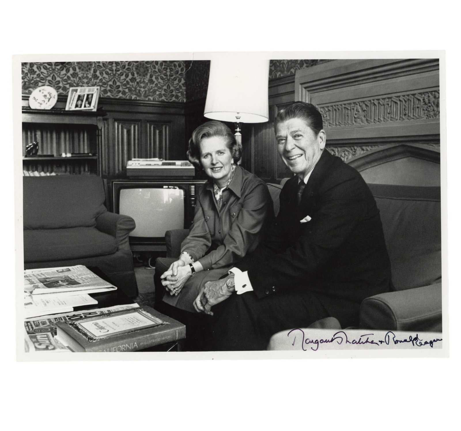 Thatcher (Margaret) & Ronald Reagan Signed photograph: Thatcher (Margaret) & Ronald Reagan Signed photograph Glossy black and white photograph of Thatcher and Reagan taken during a meeting at the House of Commons in London on November 28, 1978, signed by