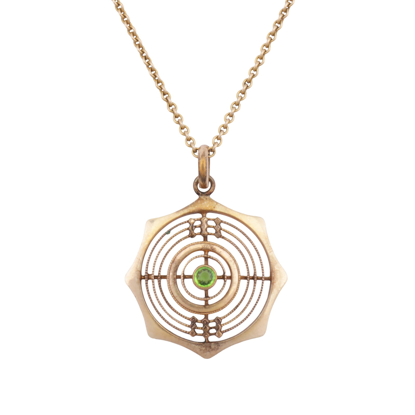 A peridot pendant necklace Yellow metal: A peridot pendant necklace Yellow metal The pendant of pierced design, with milgrain decorations, centrally set with a circular-cut peridot, suspended to a cable link chain necklace, barrel clasp, cha