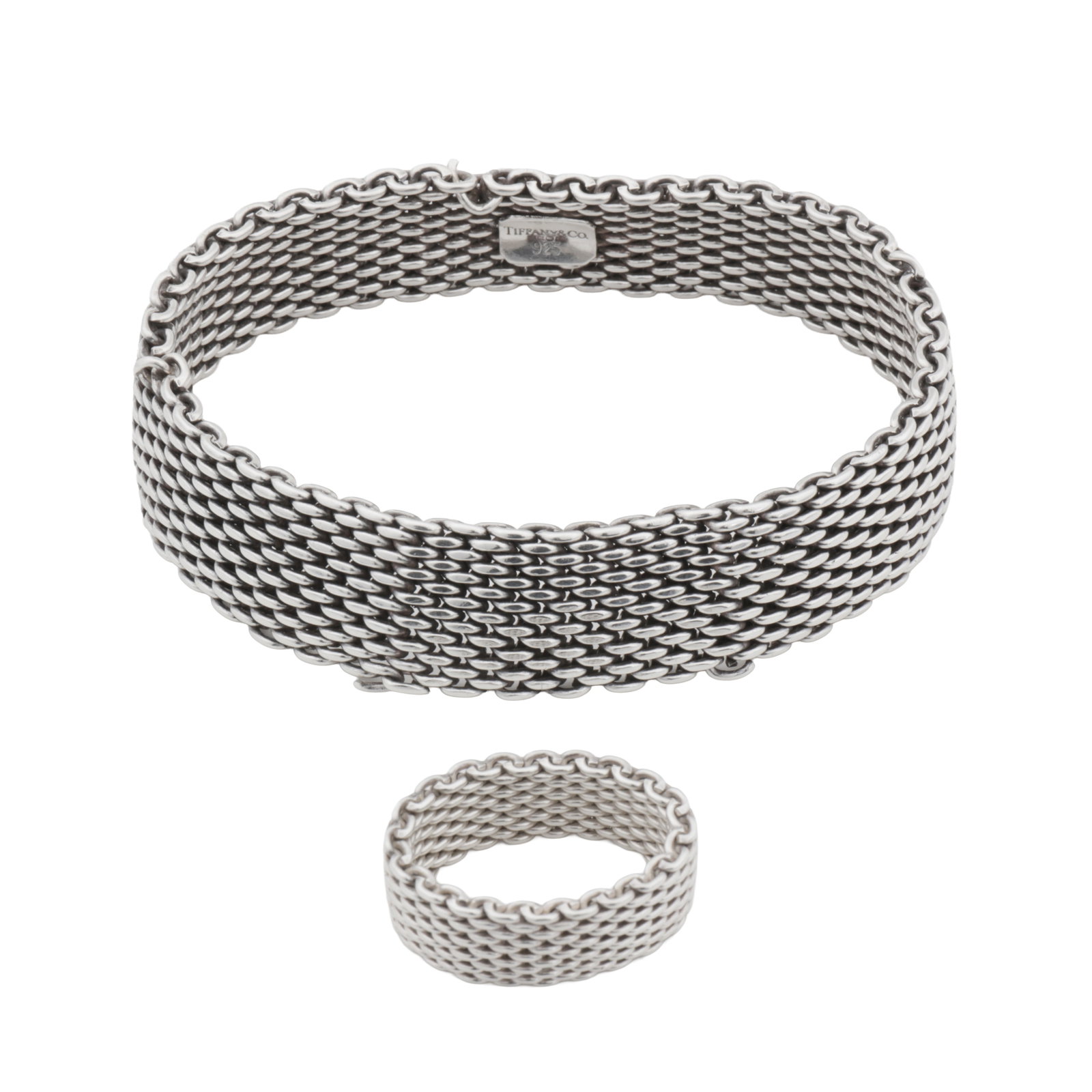 Tiffany & Co. | A mesh bracelet and ring suite: Tiffany & Co. | A mesh bracelet and ring suite The wide soft bracelet and ring, with a logo plaque in the inner band, signed Tiffany; the bracelet with maker's mark and UK hallmark, the ring signed