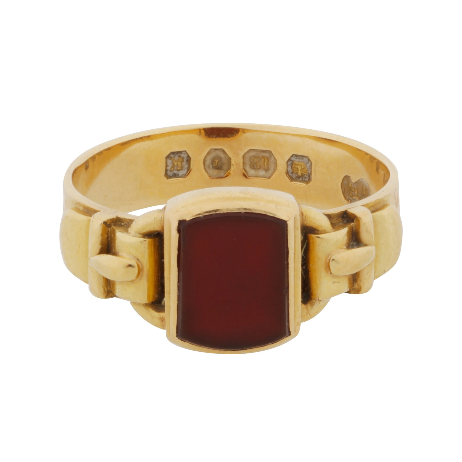 A carnelian single stone ring 18ct yellow gold: A carnelian single stone ring 18ct yellow gold Of belt design, collet-set with a carnelian slab, decorated shoulders, maker's mark, UK hallmark, ring size N