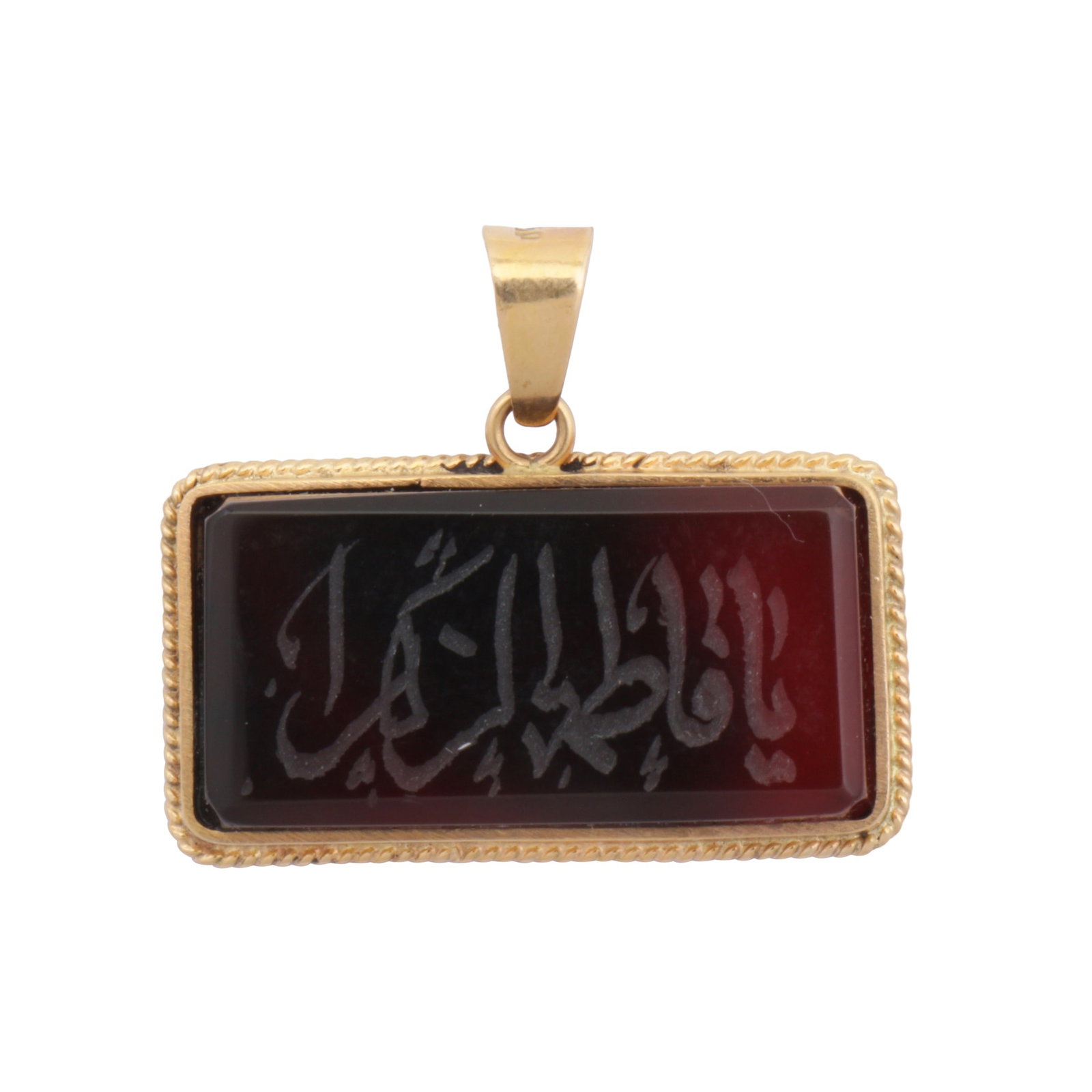 A sardonyx pendant Yellow metal: A sardonyx pendant Yellow metal The rectangular plaque, engraved with an arabic inscription, to a yellow mount, bail stamped 750, length 2.7cm, width 3.2cm