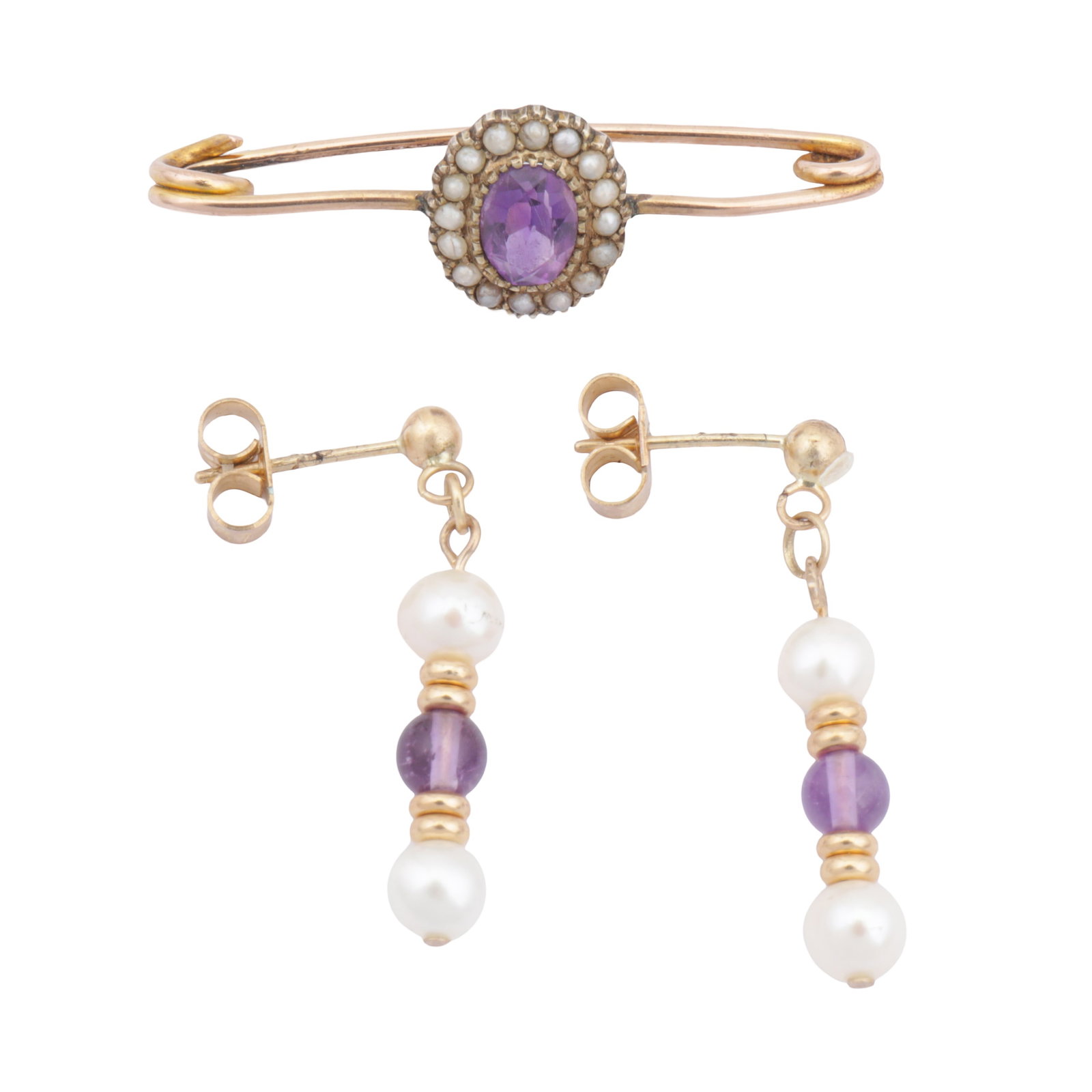 A group of pearl and amethyst jewellery Yellow metal: A group of pearl and amethyst jewellery Yellow metal Including an amethyst and seed pearl brooch; together with a pair of amethyst and cultured pearl pendent earrings, both set in yellow metal, stampe