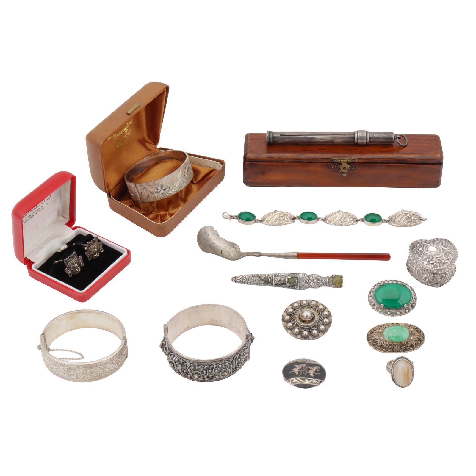A collection of silver jewellery and objects White metal: A collection of silver jewellery and objects White metal To include a Bravingtons bangle with a fitted case, two decorated bangles, a heart box, four brooches, a bracelet, a ring, a pair of