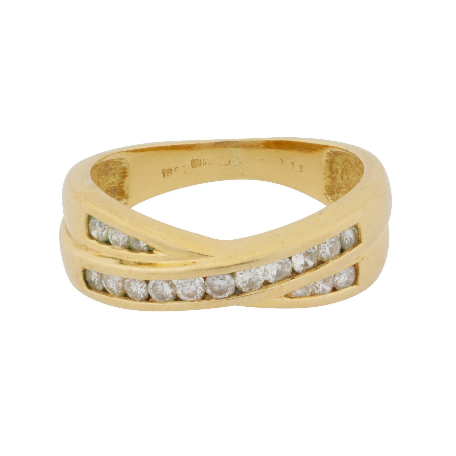 A diamond ring Yellow metal: A diamond ring Yellow metal of crossover design, channel-set with brilliant-cut diamonds, diamonds approx. 0.30 carat total, Indistinct UK import mark, stamped '18', ring size L