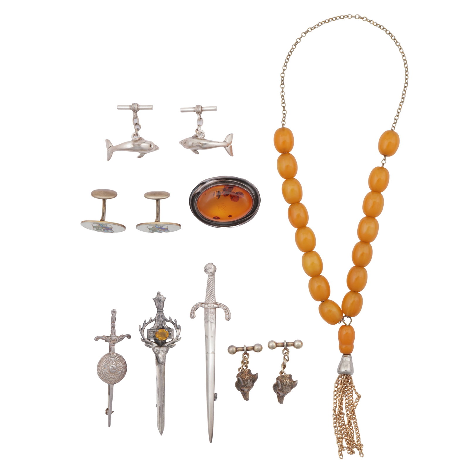 A collection of jewellery White and yellow metal: A collection of jewellery White and yellow metal Including three pairs of cufflinks; three sword brooches; an amber oval brooch, all set in white metal; and a strand of bakelite prayer beads, set in y