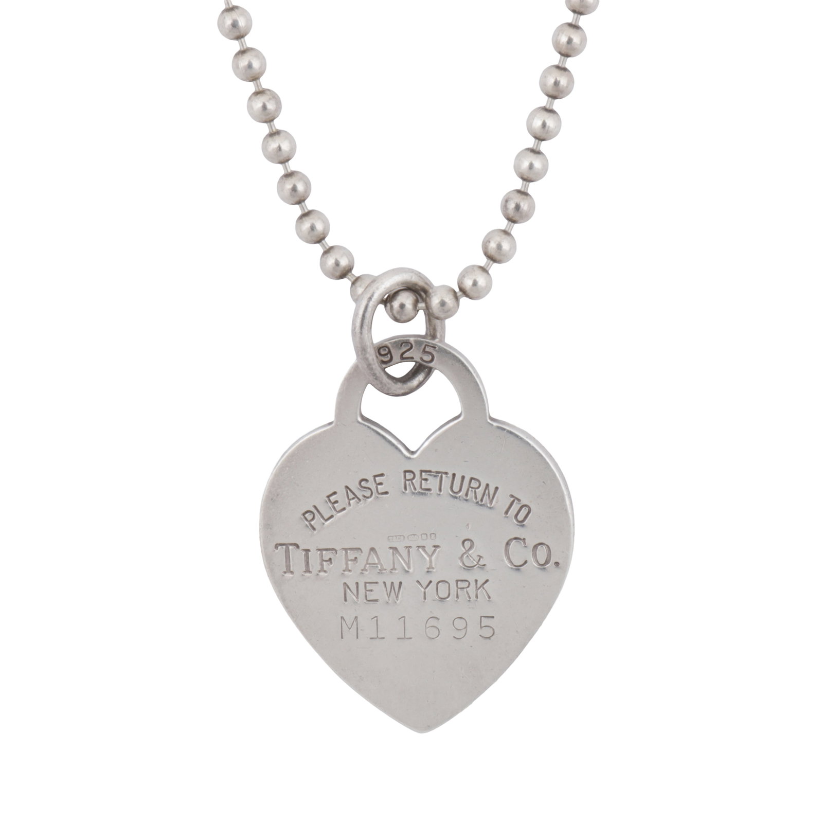 Tiffany & Co, Ι A 'Return to Tiffany' heart necklace Silver: Tiffany & Co, Ι A 'Return to Tiffany' heart necklace Silver The long bead-link chain with lobster clasp, suspending a heart pendant, inscribed 'Please Return To Tiffany New York', signed,