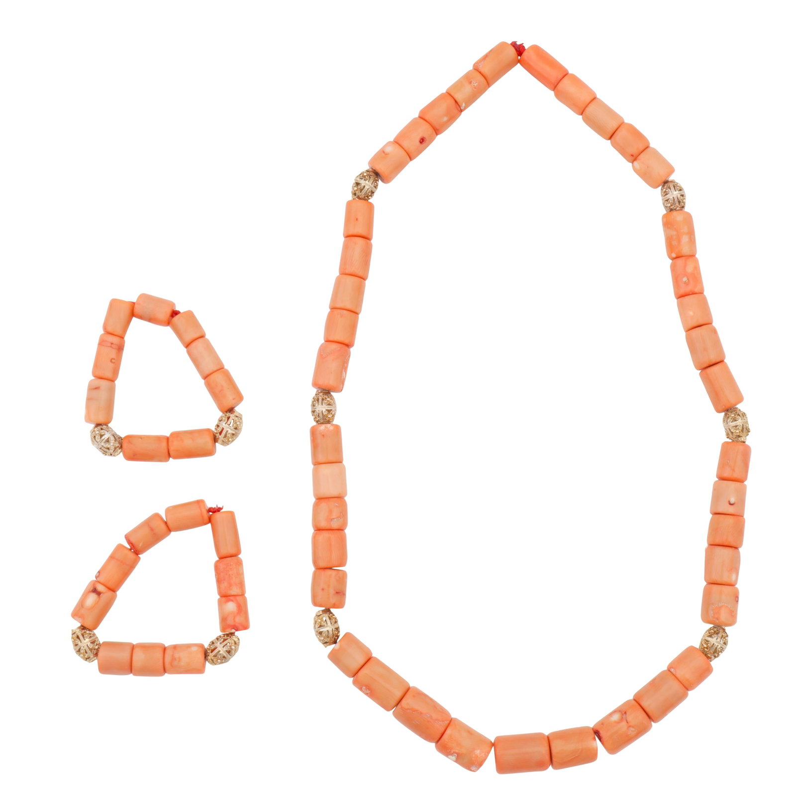 A coral necklace and two bracelets suite Yellow metal: A coral necklace and two bracelets suite Yellow metal Composed of tubular coral beads, accented by oval-shaped metal beads of openwork decorated design; metal unmarked and untested (3)