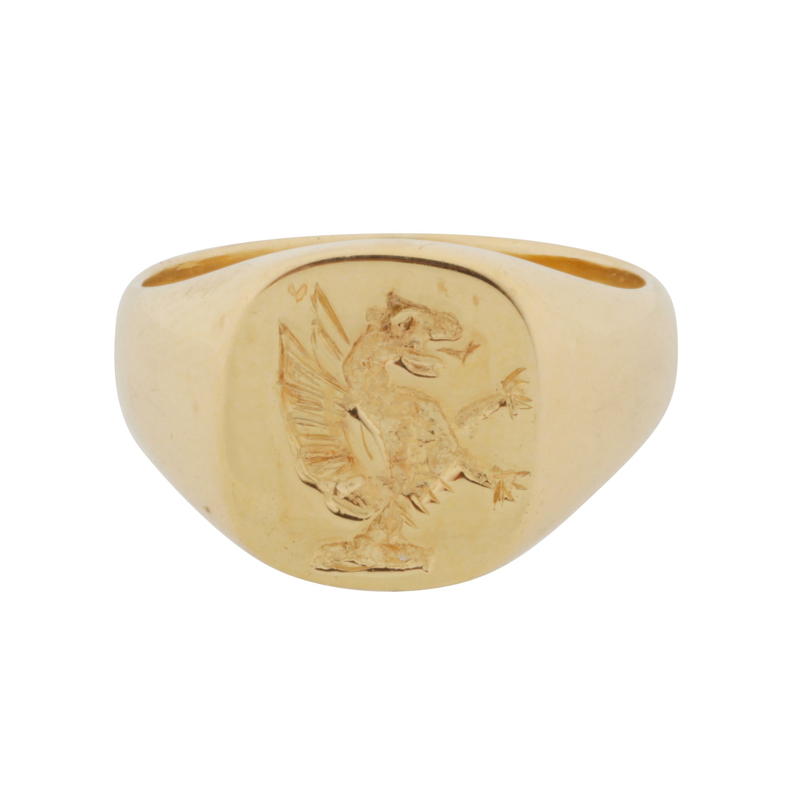An intaglio signet ring Yellow metal: An intaglio signet ring Yellow metal Of square design, featuring an eagle, to tapered shoulders, stamped 750, size F