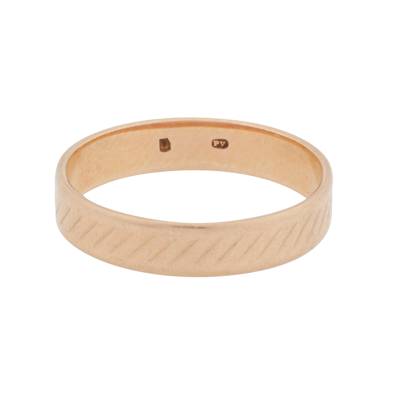 A band ring Yellow metal: A band ring Yellow metal To engraved reeded decoration, Hungarian assay mark, ring size T