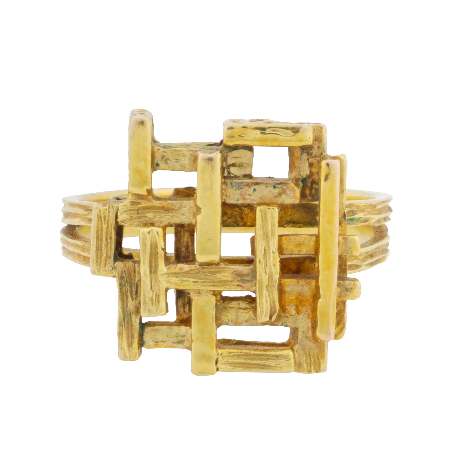 An abstract ring Yellow metal: An abstract ring Yellow metal Of square form and pierced design, to polished and textured finish, yellow metal unmarked and untested, ring size L½ The item has been XRF tested and found to be