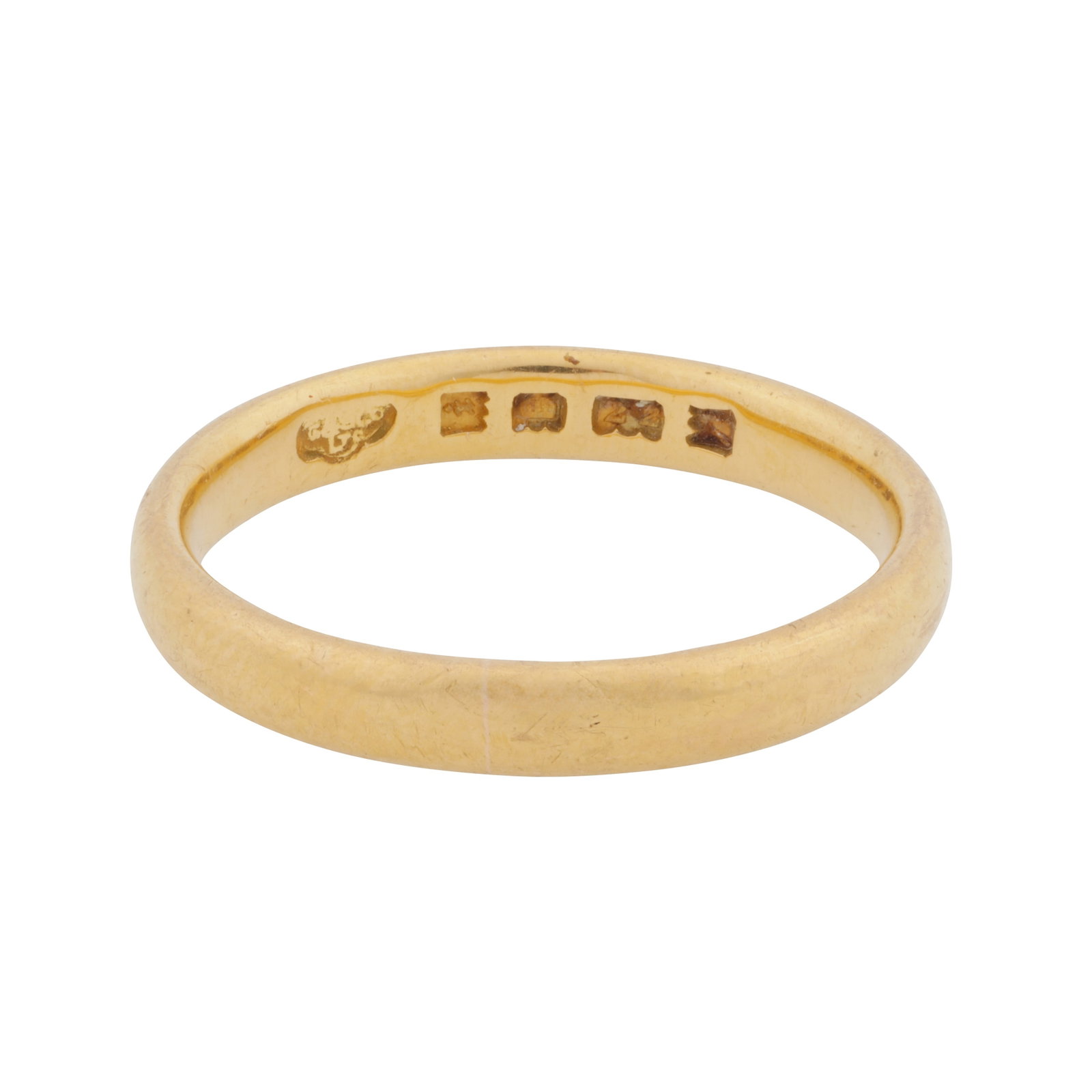 A band ring 22ct yellow gold: A band ring 22ct yellow gold The 3.1mm wide band of polished design, maker's mark, UK hallmark, size O