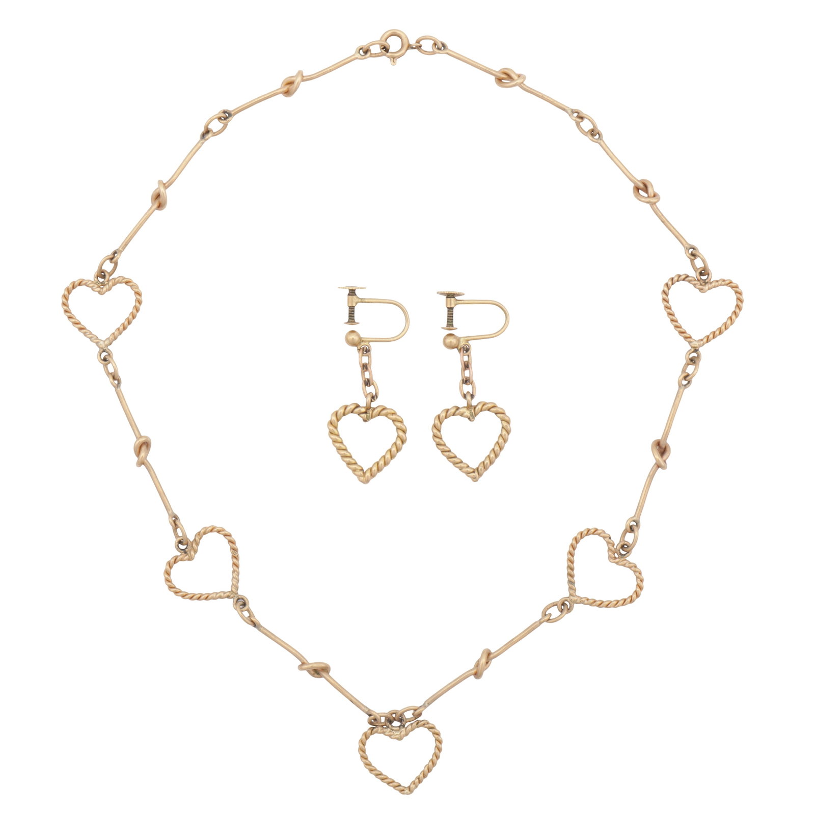 A heart necklace and earrings suite Yellow metal: A heart necklace and earrings suite Yellow metal The bar and knot-link chain necklace, with heart motifs of rope-twist design, bolt ring clasp, together with a pair of matching pendent earrings,