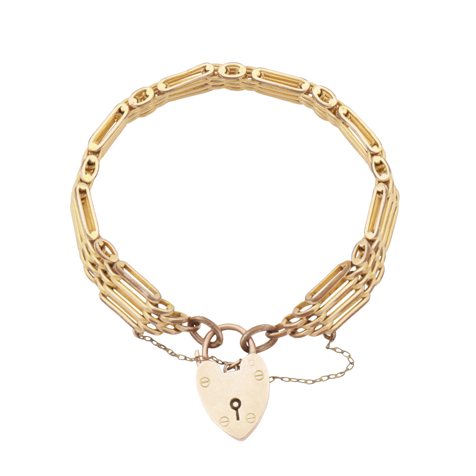 A gate bracelet Yellow metal: A gate bracelet Yellow metal With a heart padlock and safety chain to a fancy-link bracelet, set in yellow metal, padlock stamped 9ct, length approx. 18.0cm The item has been XRF tested and found to