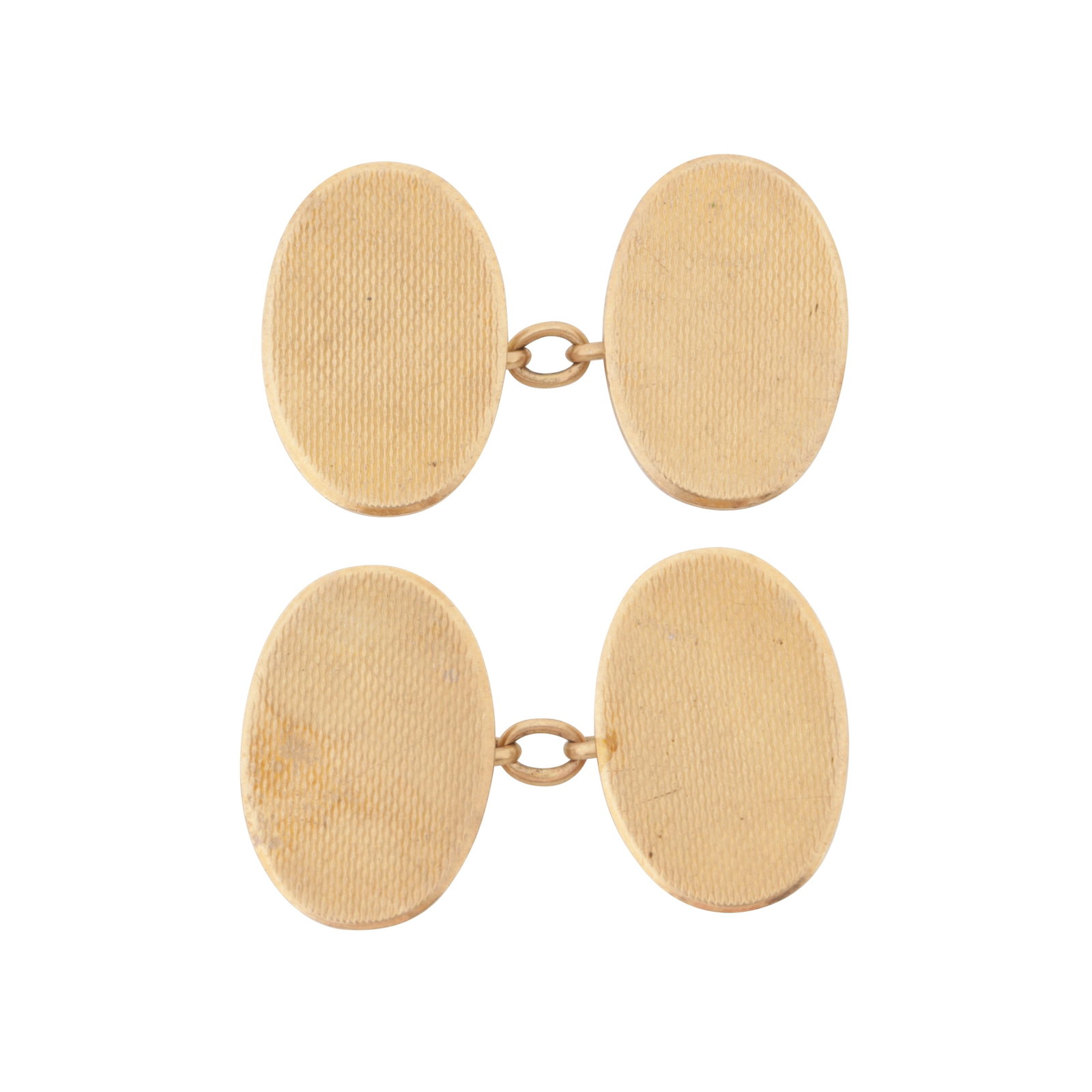 A pair of cufflinks 9ct yellow gold: A pair of cufflinks 9ct yellow gold Double-sided: Each oval-shaped terminal of engine-turned decoration, between cable-link connectors, maker's mark, UK hallmark, terminal length 2.0cm