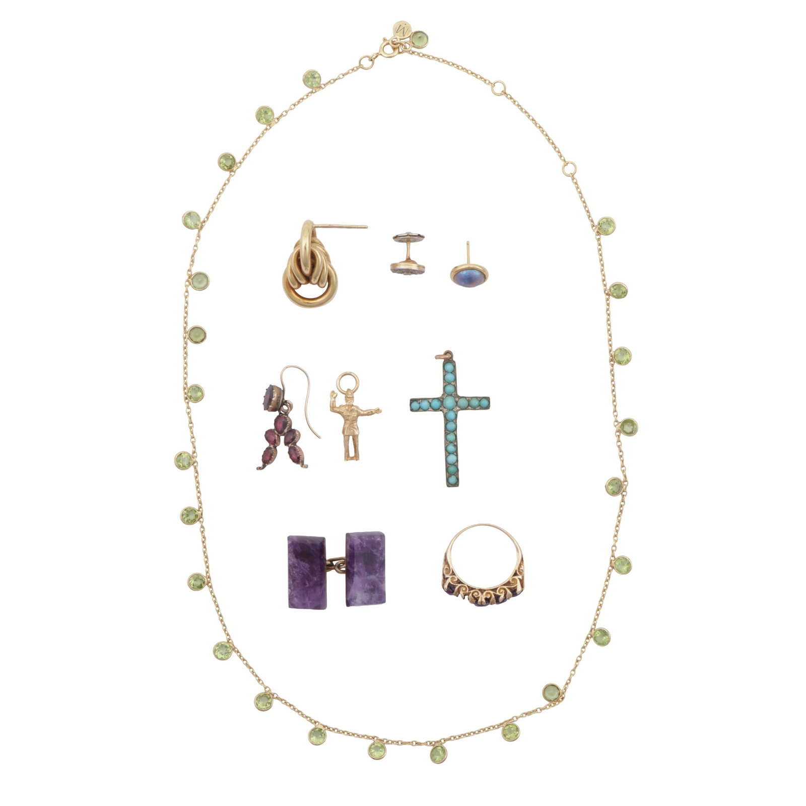 A collection of jewellery Yellow metal: A collection of jewellery Yellow metal Including a peridot necklace, stamped 925; a single amethyst cufflink, ,stamped 9ct; a charm set in 14ct gold, UK hallmark; a turquoise cross, stamped 750; a mot