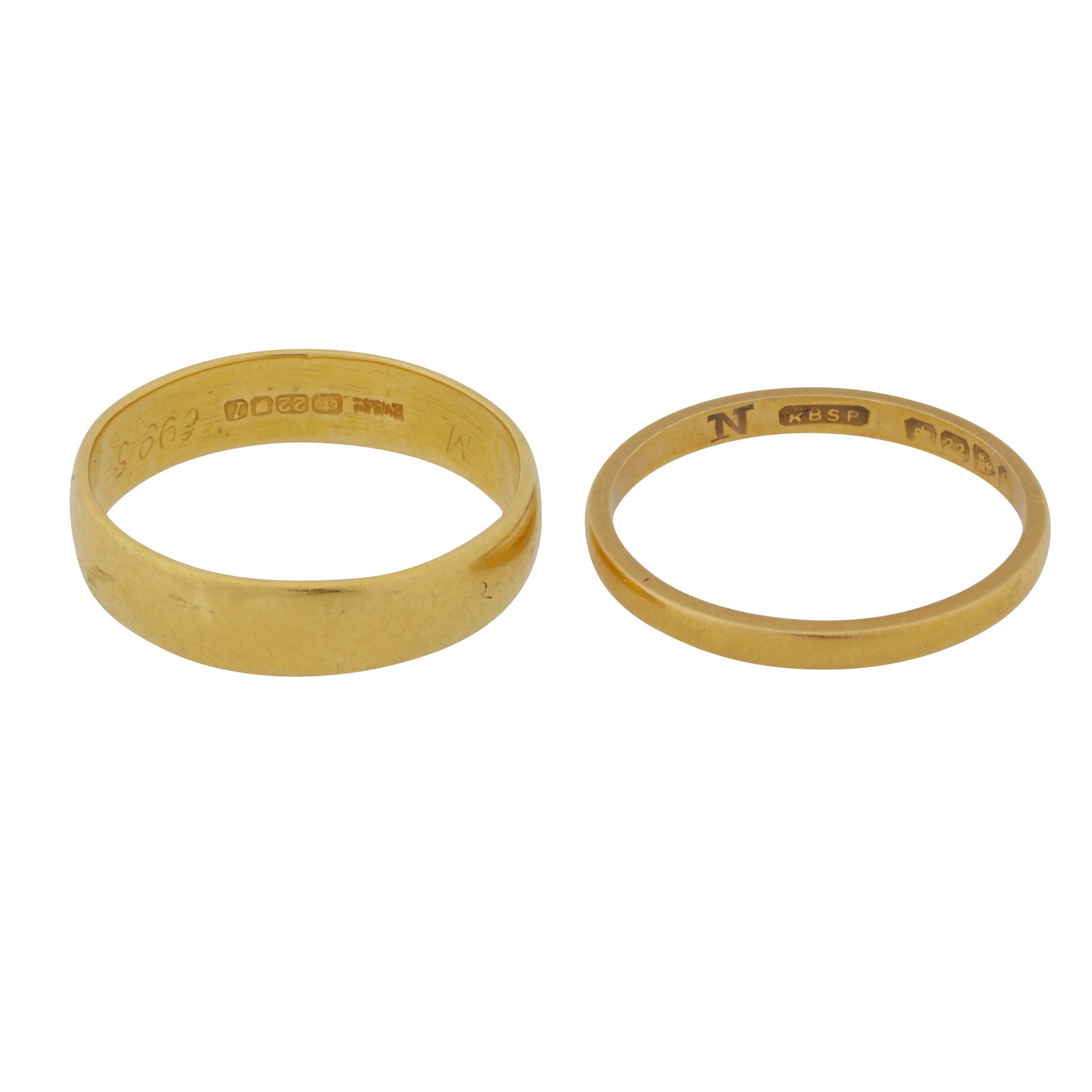 Two gold band rings 22 carat yellow gold: Two gold band rings 22 carat yellow gold Both of polished finish, set in 22 carat yellow gold, UK hallmarks, ring sizes O½ & P (2)