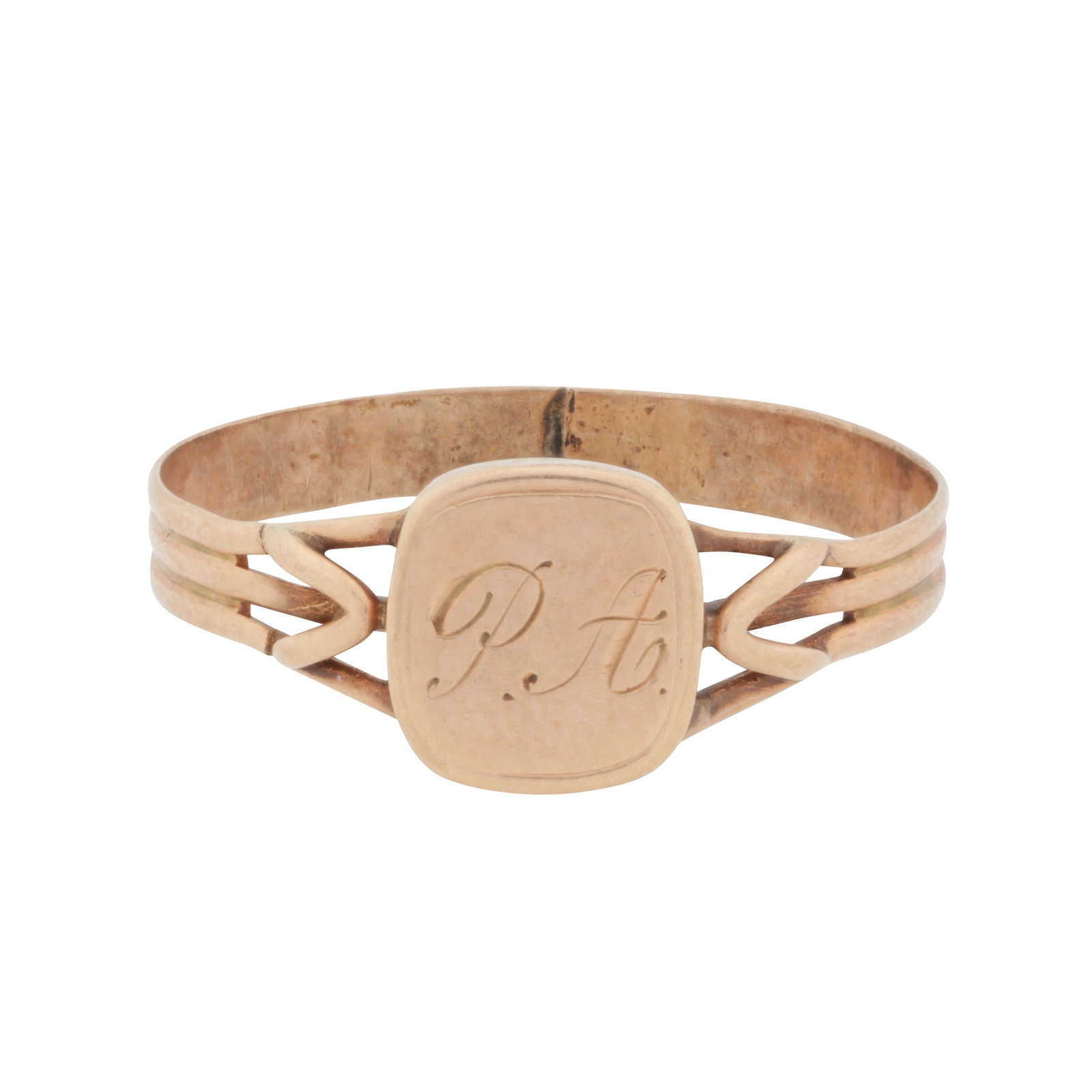 A signet ring Yellow metal: A signet ring Yellow metal Centrally decorated with an engraved monogram 'P.A', to trifurcated shoulders, set in yellow metal, Austro-hungarian assay mark, ring size Q
