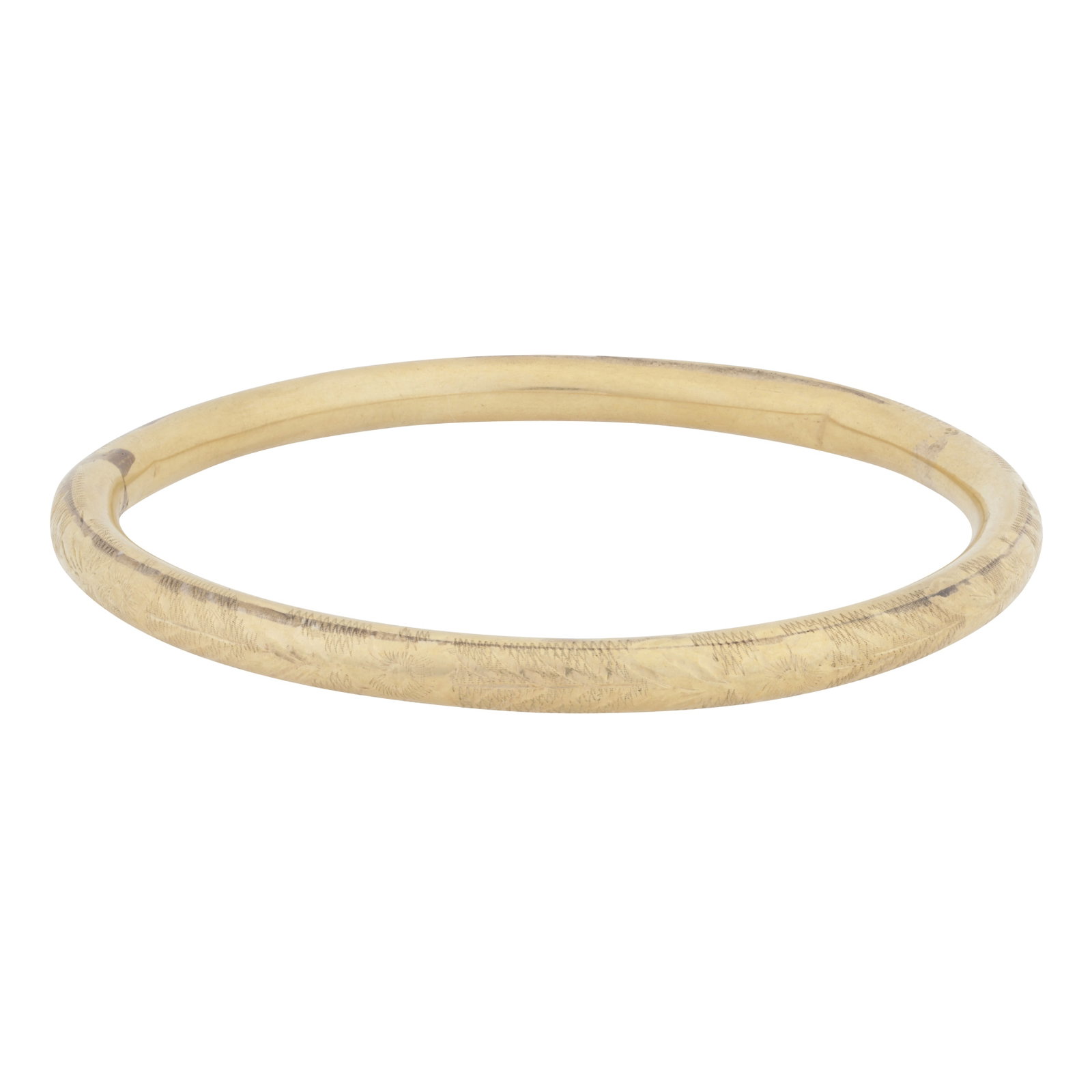 A bangle Yellow metal: A bangle Yellow metal Of engraved design, Austro-hungarian assay mark, inner diameter 6.0cm