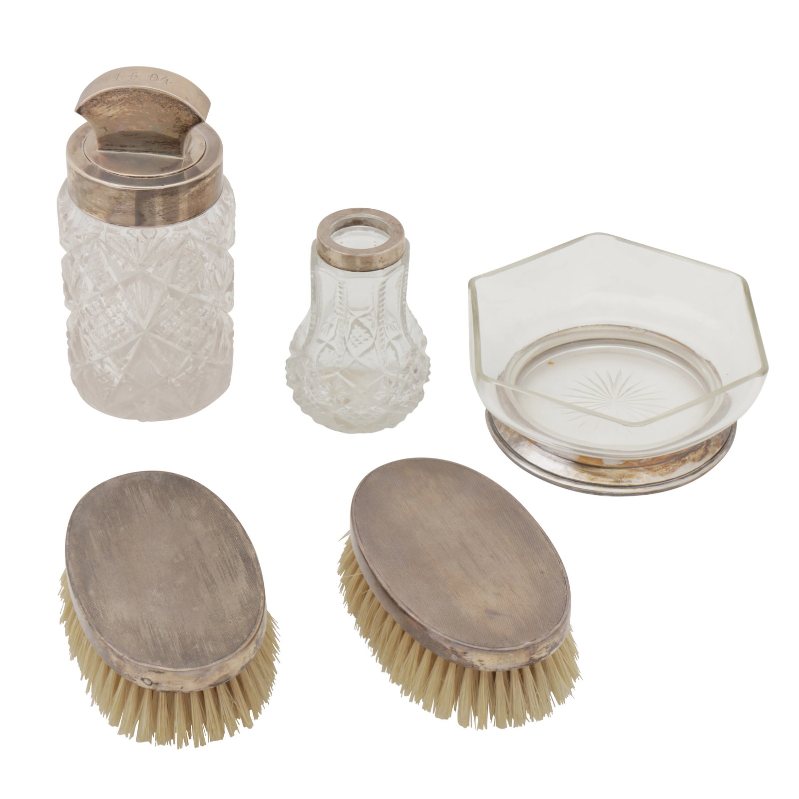 Pairs circa 1915, possibly by Louis Pechard An early 20th century French 950 standard silver mounted: Pairs circa 1915, possibly by Louis Pechard An early 20th century French 950 standard silver mounted glass dish Together with a German 800 standard silver mounted glass crème jar, an Edwardian