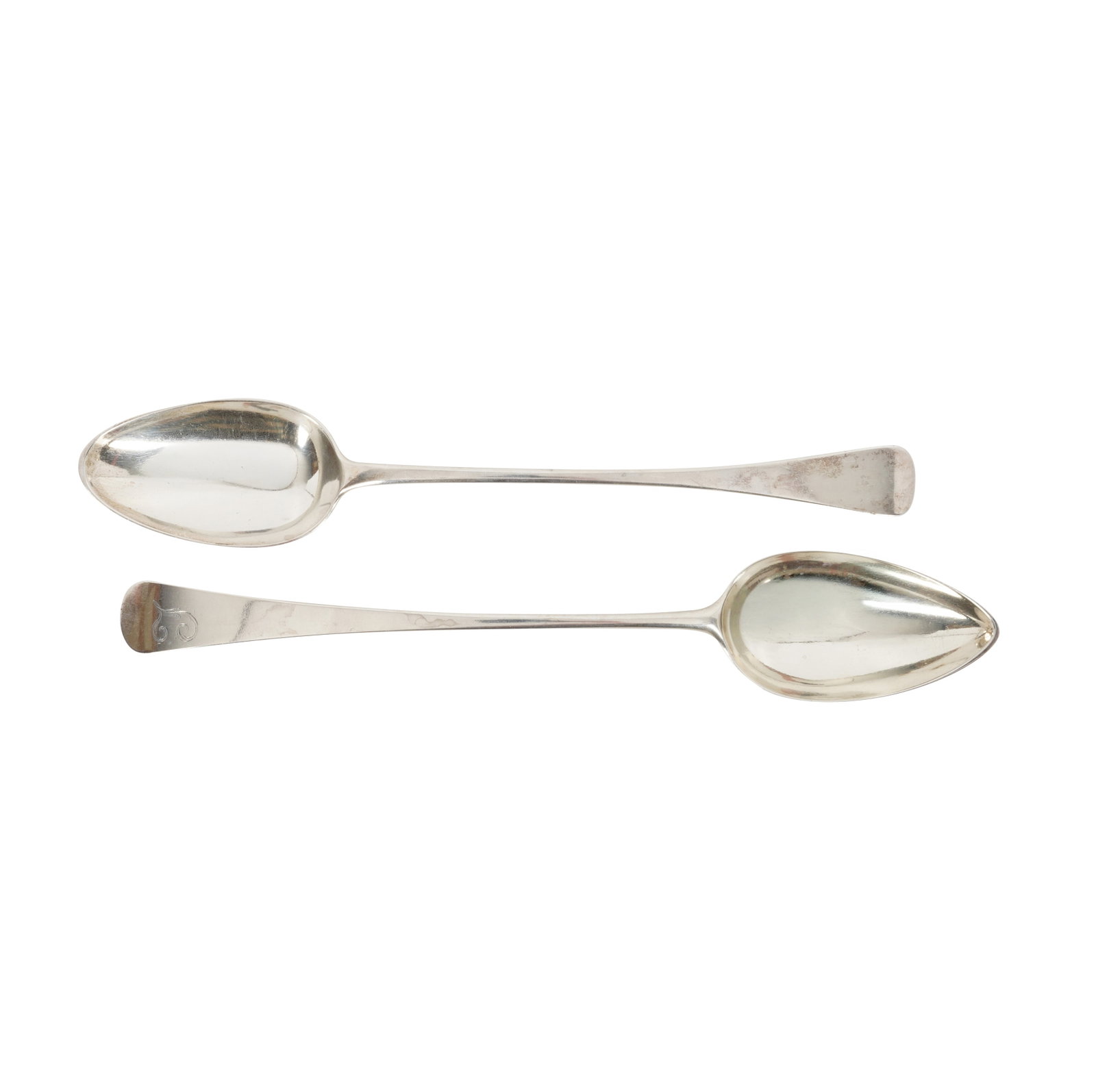 Newcastle 1801 by Christian Reid A George III provincial sterling silver basting spoon: Newcastle 1801 by Christian Reid A George III provincial sterling silver basting spoon Old English pattern. Together with a London 1818 by William Eley and William Fearn example. (2) Length -31.6 cm /