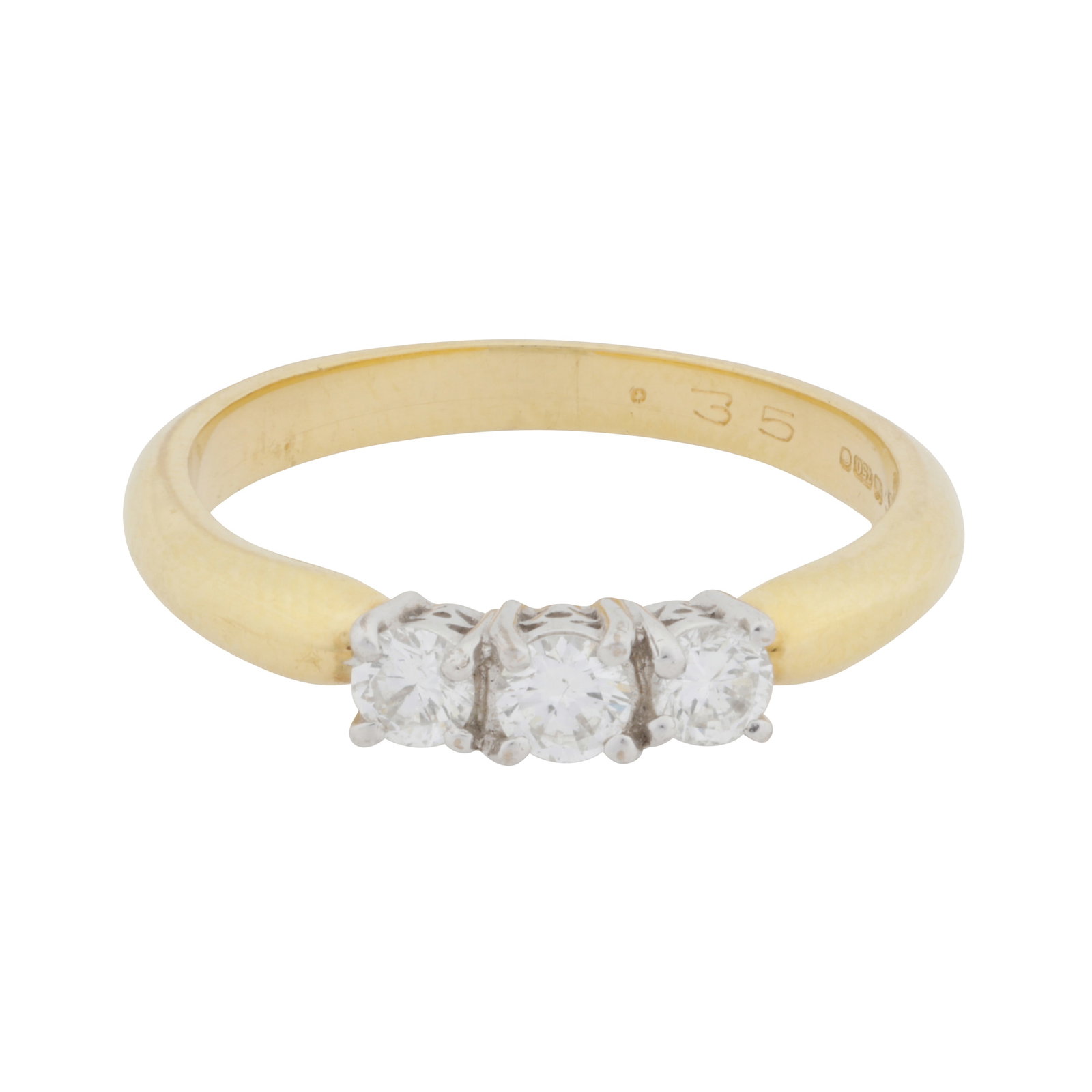 A three-stone diamond ring 18 carat yellow and white gold: A three-stone diamond ring 18 carat yellow and white gold Set with slightly graduated brilliant-cut diamonds, mounted in 18 carat yellow and white gold, diamonds approx. 0.35 carat total, ring size N