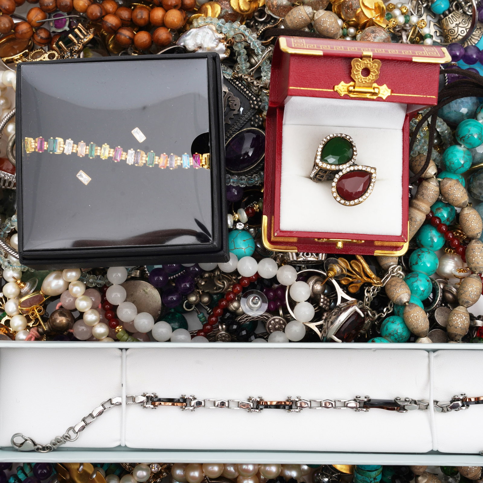 A collection of silver, gemstones, and costume jewellery Yellow and white metal: A collection of silver, gemstones, and costume jewellery Yellow and white metal To include necklaces, bracelets, earrings, and rings; some set with gemstones such as turquoise, pearl, amethyst, citrin