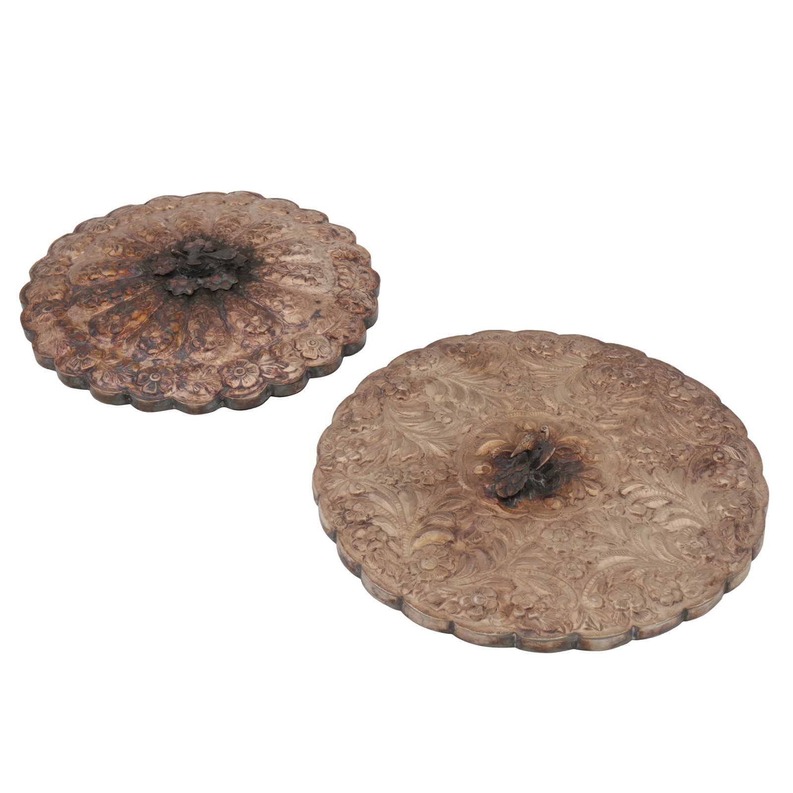 Cairo circa 1980 Two late 20th century Egyptian 900 standard mirrors: Cairo circa 1980 Two late 20th century Egyptian 900 standard mirrors Of round form with scalloped edges with embossed flowerhead decoration and peacock finials (2) Length - 15.8 cm / 6.22 inches