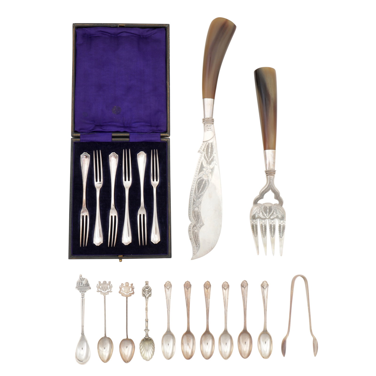 A mixed group of silver flatware: A mixed group of silver flatware Various spoons and sugar tongs, also to include a pair of mid-20th century Malaysian horn handled fish servers. (Q) Weighable silver -223 grams / 7.17 ozt