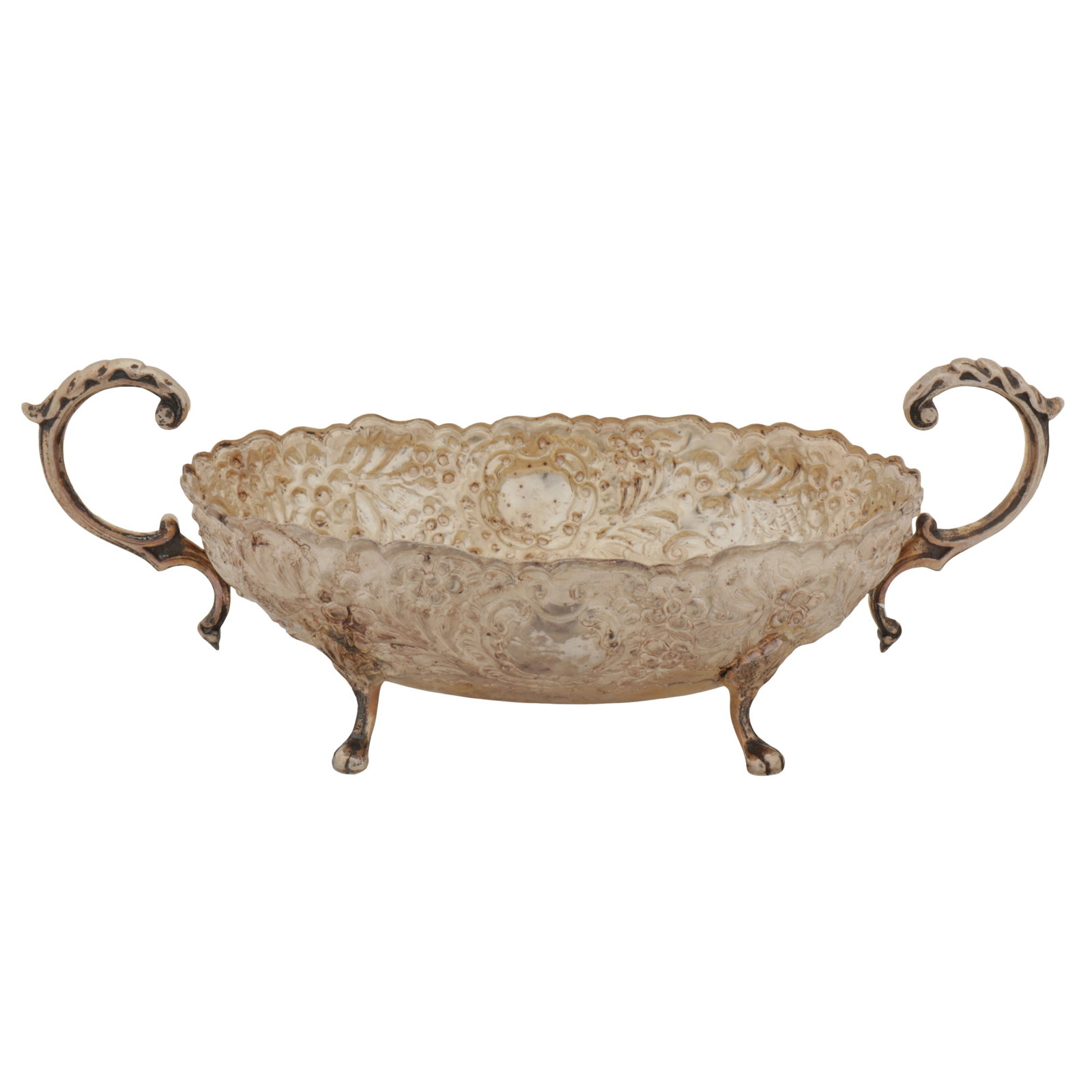 Cairo circa 1980 A late 20th century Egyptian 900 standard silver twin handled bowl: Cairo circa 1980 A late 20th century Egyptian 900 standard silver twin handled bowl Of shaped oval form, upon four paw feet, with C scroll handles and flower head embossed decoration. Length - 29.5