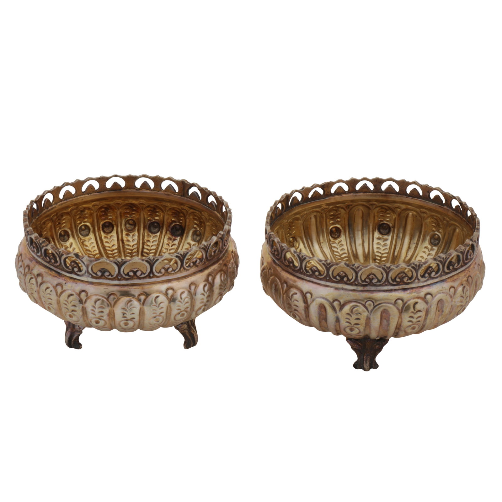 Greek or Turkish circa 1980 by KH A pair of late 20th century 800 standard silver bowls: Greek or Turkish circa 1980 by KH A pair of late 20th century 800 standard silver bowls Of rounded form, with lobed sides embossed with stylised foliate decoration. Pierced rim, upon three cast feet.