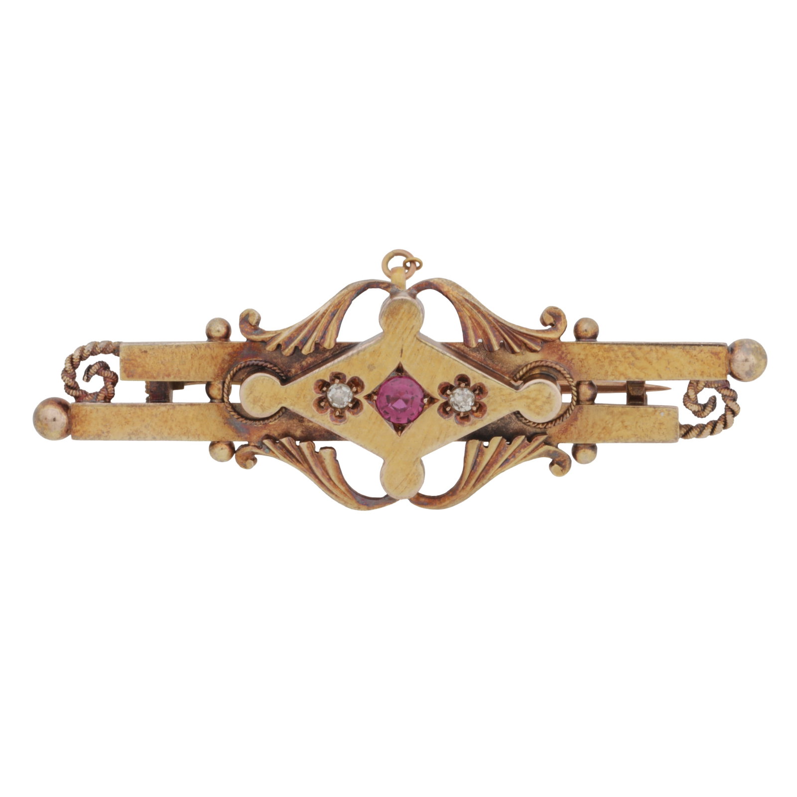 A ruby and diamond brooch 15 carat yellow gold: A ruby and diamond brooch 15 carat yellow gold Centrally-cet with a circular ruby, shouldered by an old brilliant-cut diamond on each side, to ropetwist and granulation detailing, set in a 15 carat ye