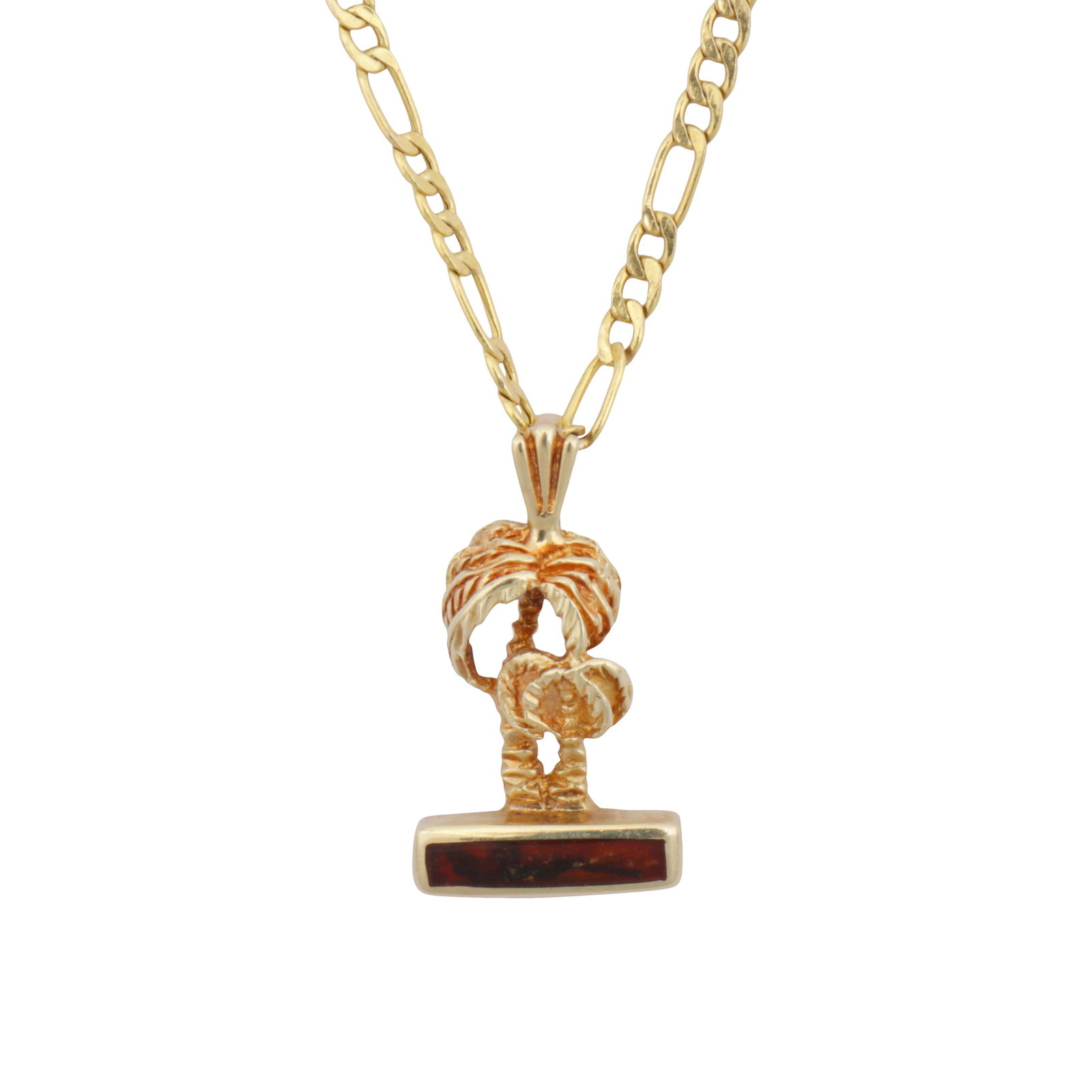 An amber palm pendant necklace Yellow metal: An amber palm pendant necklace Yellow metal The pendant featuring two palm trees, collet-set with a rectangular-cut amber slab, suspended to a figaro link chain necklace, bolt ring clasp, maker's