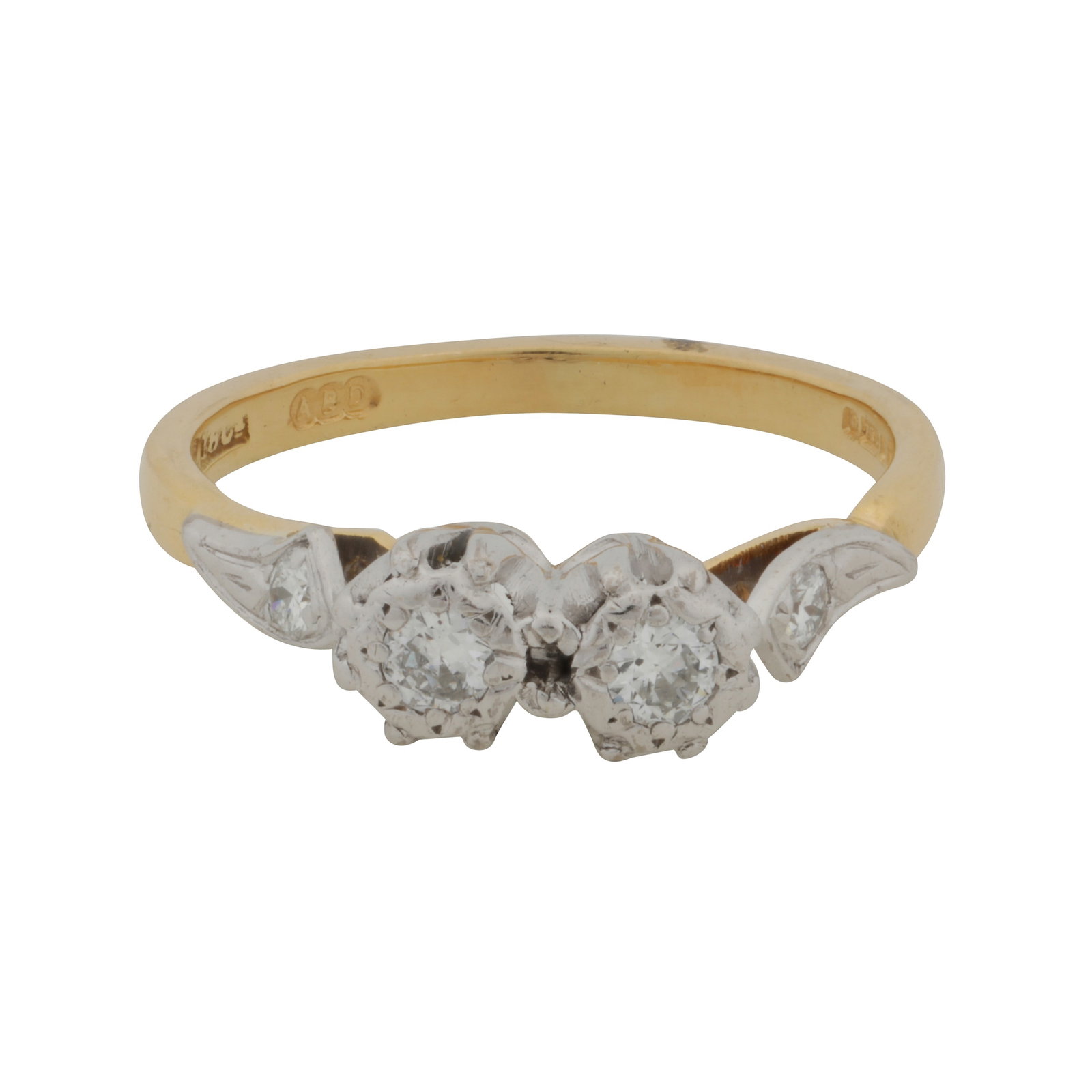 A diamond ring, circa 2000 18ct yellow and white gold: A diamond ring, circa 2000 18ct yellow and white gold Centrally illusion-set with two brilliant-cut diamonds, to similarly-cut diamond set shoulders of textured design, maker's mark, UK hallmark,