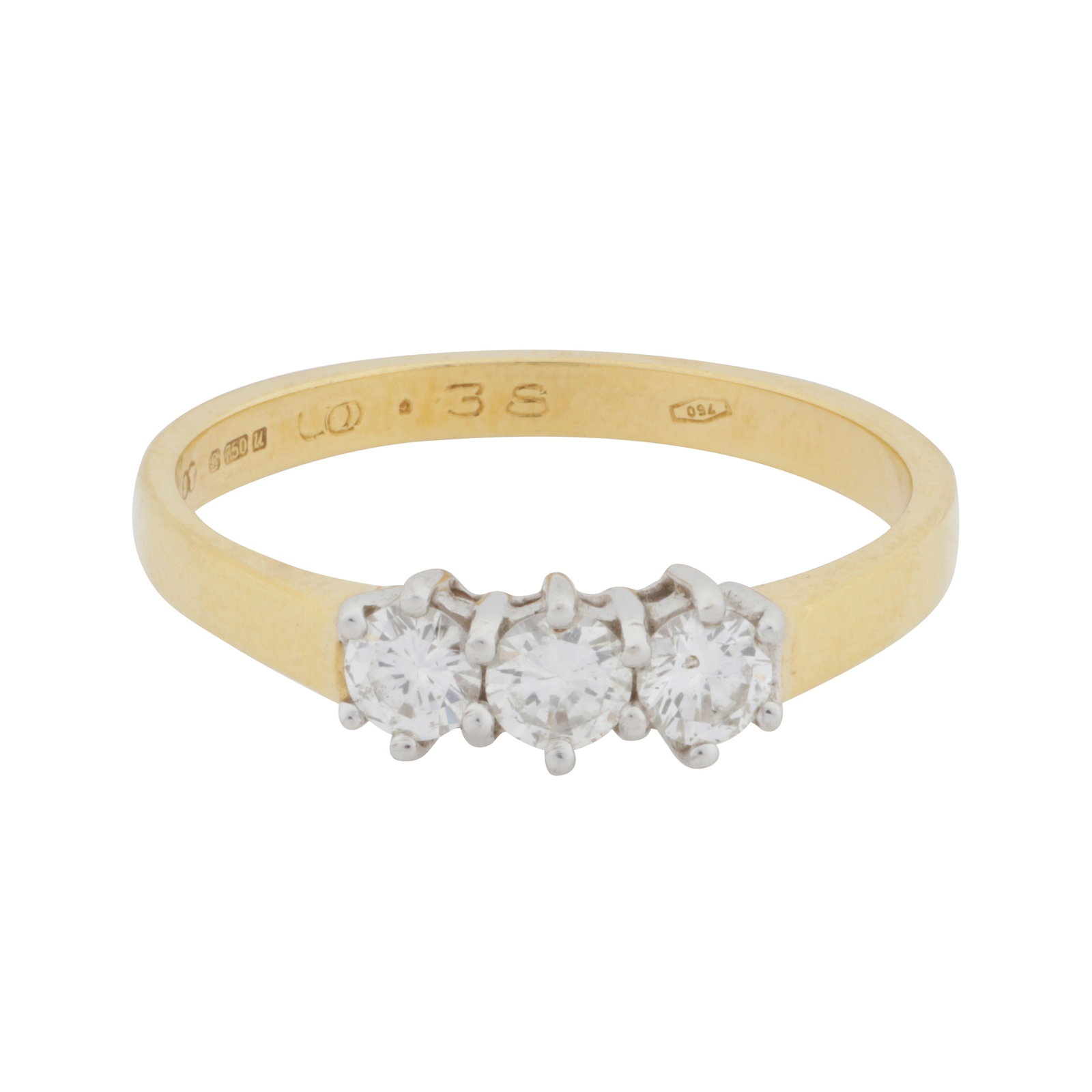 A three-stone diamond ring, circa 1994 18 carat yellow and white gold: A three-stone diamond ring, circa 1994 18 carat yellow and white gold Set with brilliant-cut diamonds, mounted in 18 carat yellow and white gold, diamonds approx. 0.35 carat total, UK import mark, rin