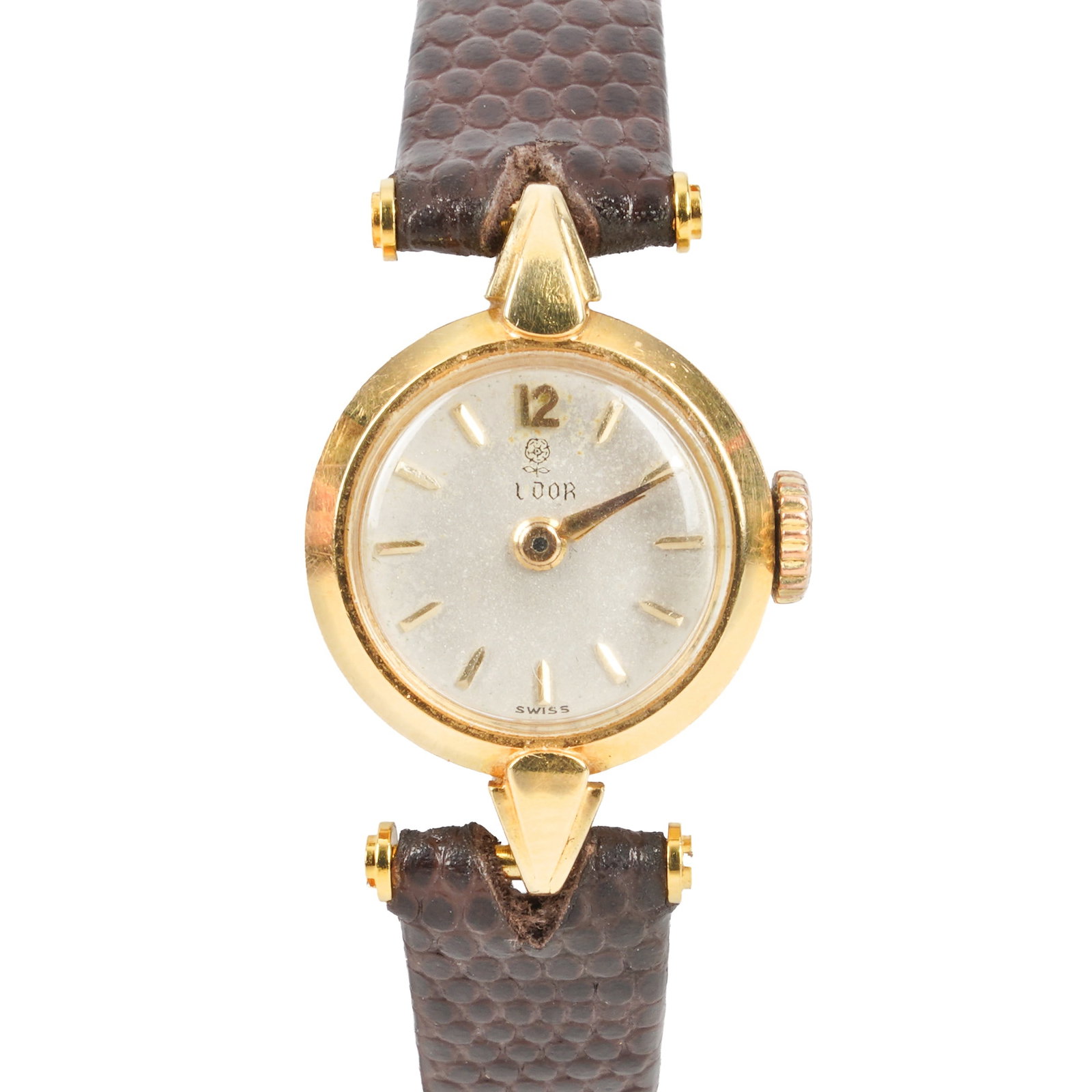 Tudor Dress Watch 18K Gold: Tudor Dress Watch 18K Gold Model/Type: Dress Date: c.1960's Movement: Mechanical, hand-wound Dial: Silvered, applied gilt-metal batons and Arabic numerals at 12 o'clock (Note: Some loss to the