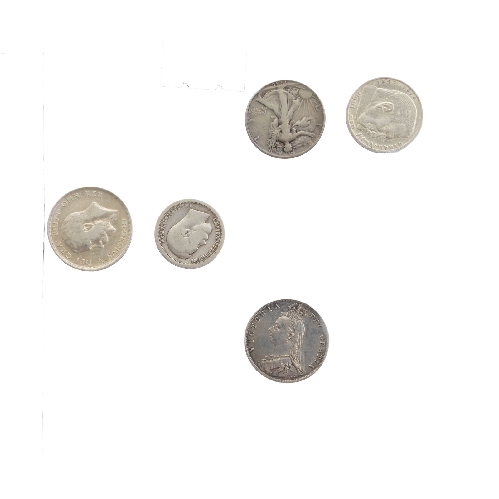 A large folder of coins to include silver examples. - 7