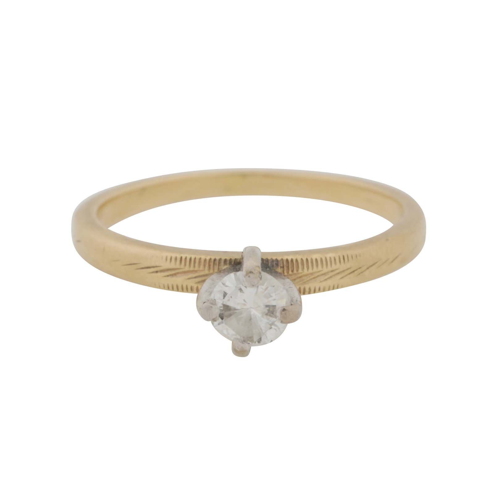 A diamond single stone ring Yellow and white metal: A diamond single stone ring Yellow and white metal Claw-set with a brilliant-cut diamond centre, to textured shouldered, stamped 14K, size J