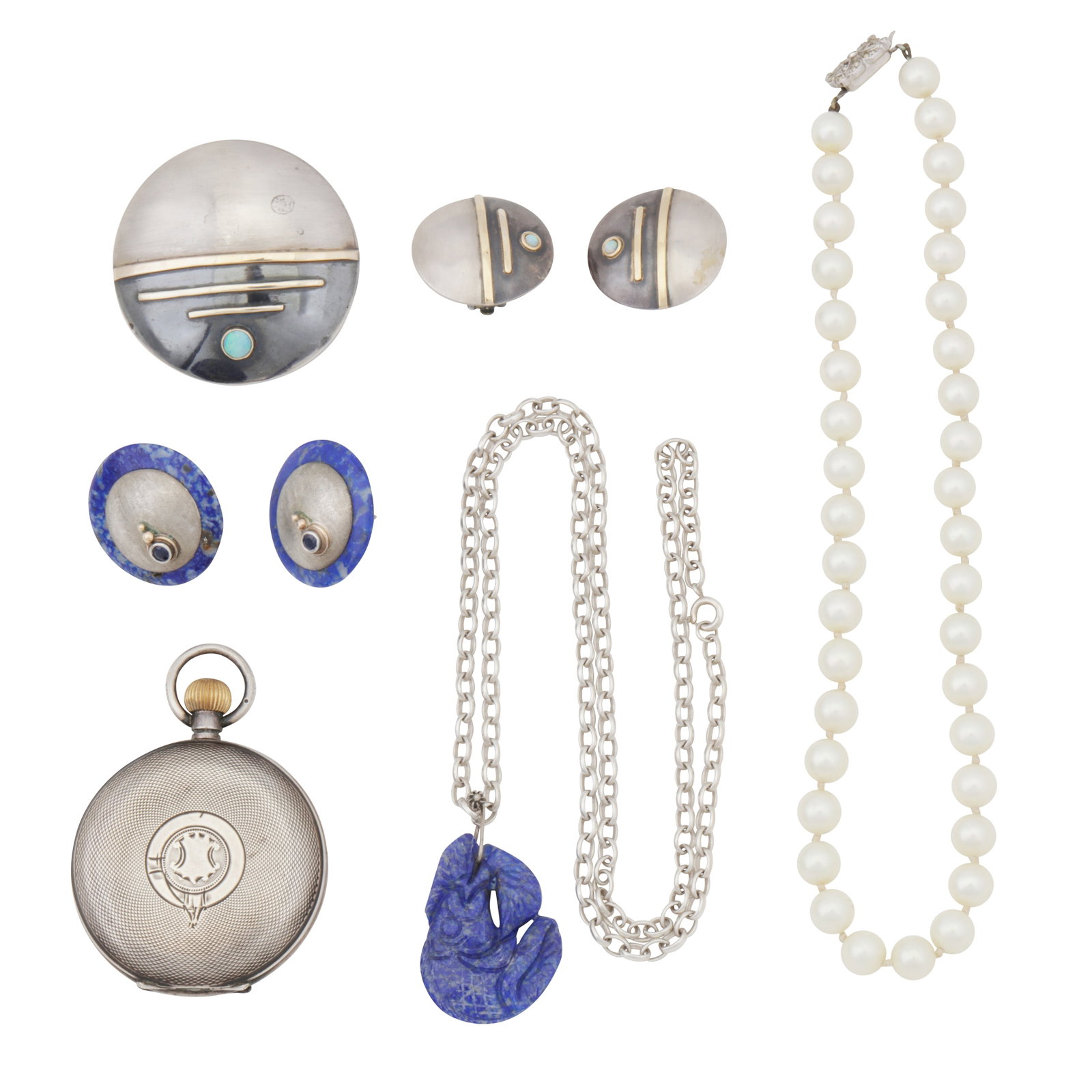 A collection of jewellery White and yellow metal: A collection of jewellery White and yellow metal To include an opal suite of brooch and earrings, a carved lapis lazuli pendant necklace, a pair of lapis lazuli and sapphire earrings, an imitation pea