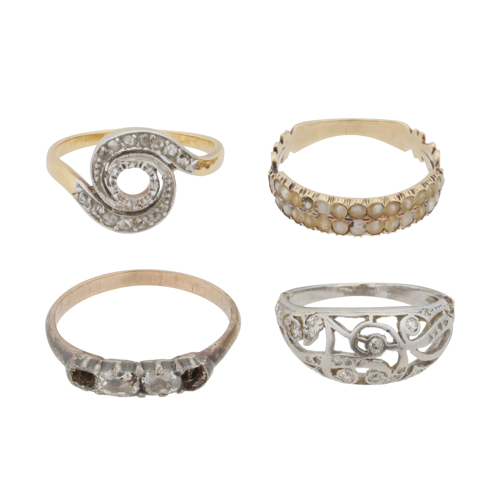 Four gem-set rings Yellow and white metal (1 of 3)
