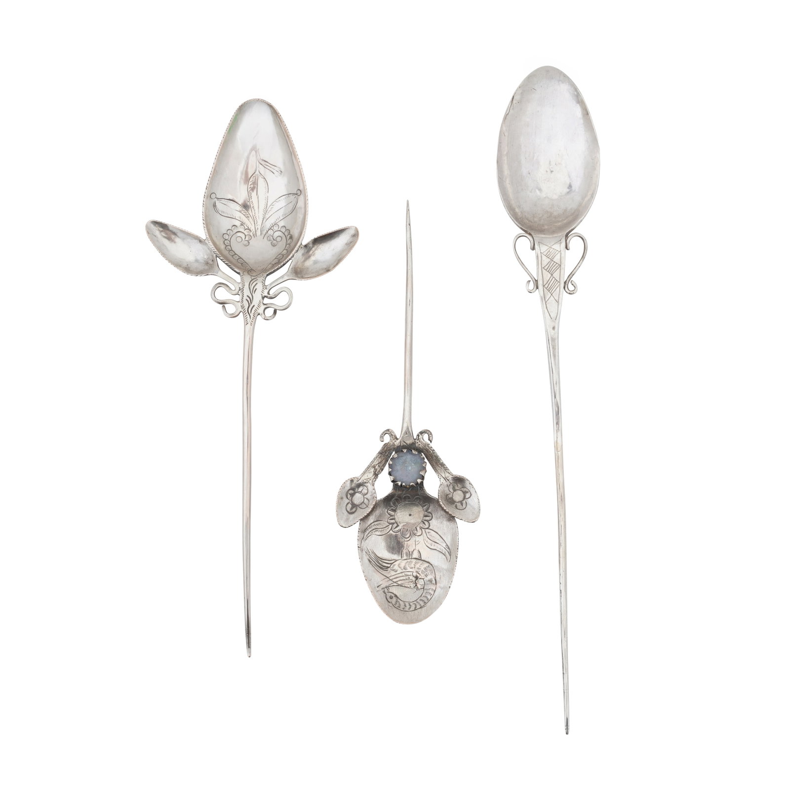 Three Bolivian silver Tupo (pin spoons), 20th century: Three Bolivian silver Tupo (pin spoons), 20th century Each with chased or engraved decoration. (3) Weight – 116 grams / 3.73 ozt